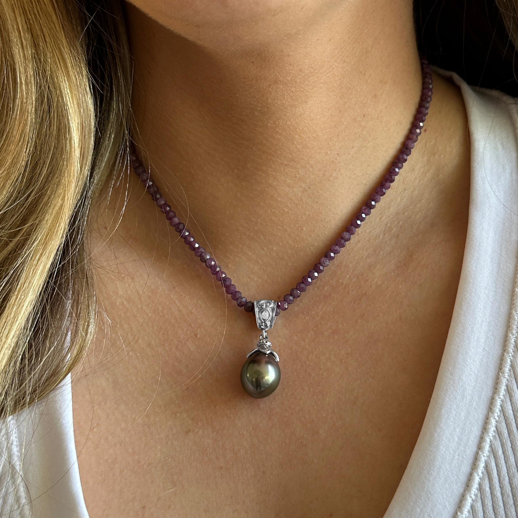 One of our favorite designs -- Eytan Brandes' gorgeous two-part  slider pendant -- is now presented in 18 karat white gold and paired with a gorgeous, silky Tahitian pearl.

The pearl is from George Hajjar, owner of Seven Seas Pearls, based in Los