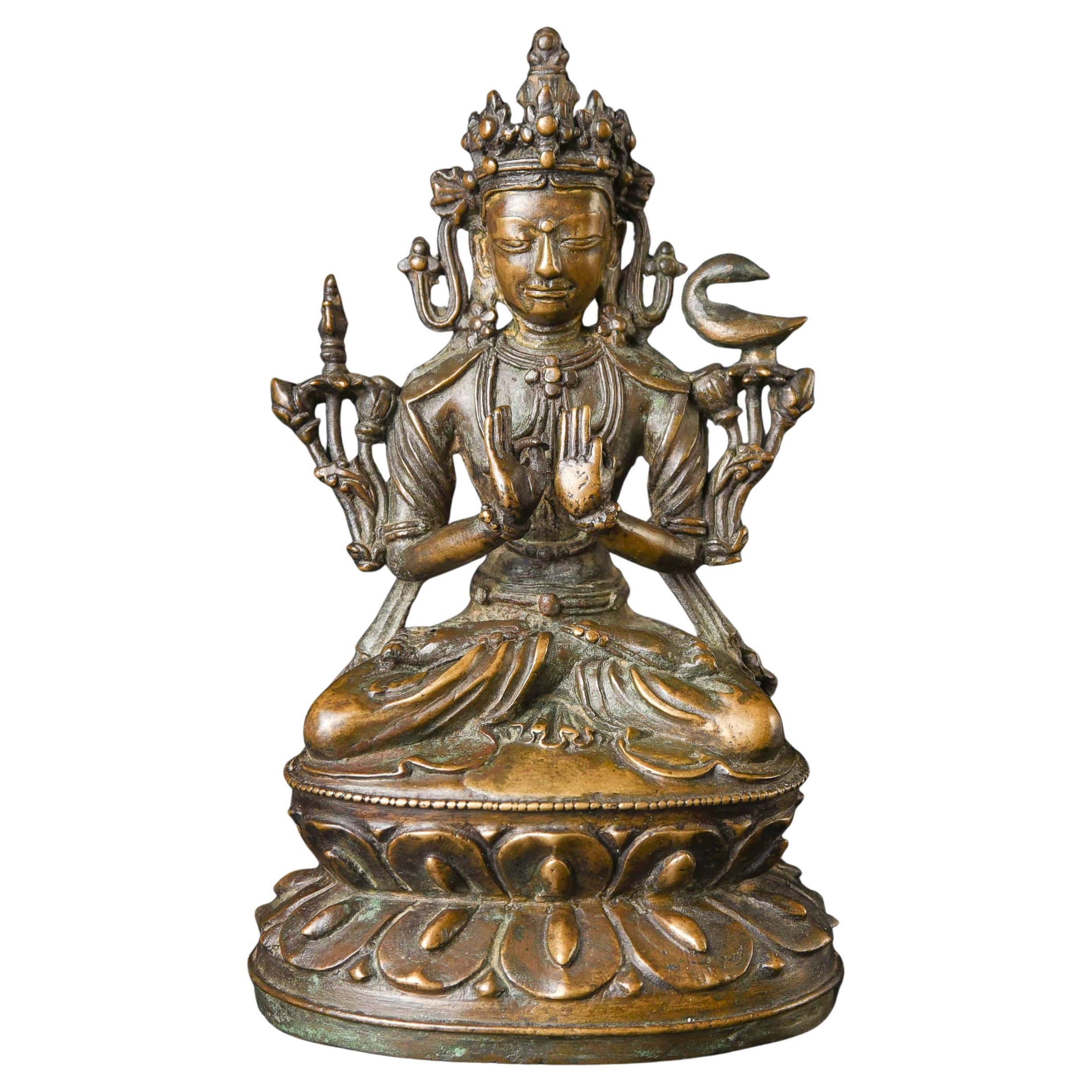 Bouddha/bodhisattva tibétain en bronze des XIIIe et XIVe siècles. Sculpture puissante et fine, moulage