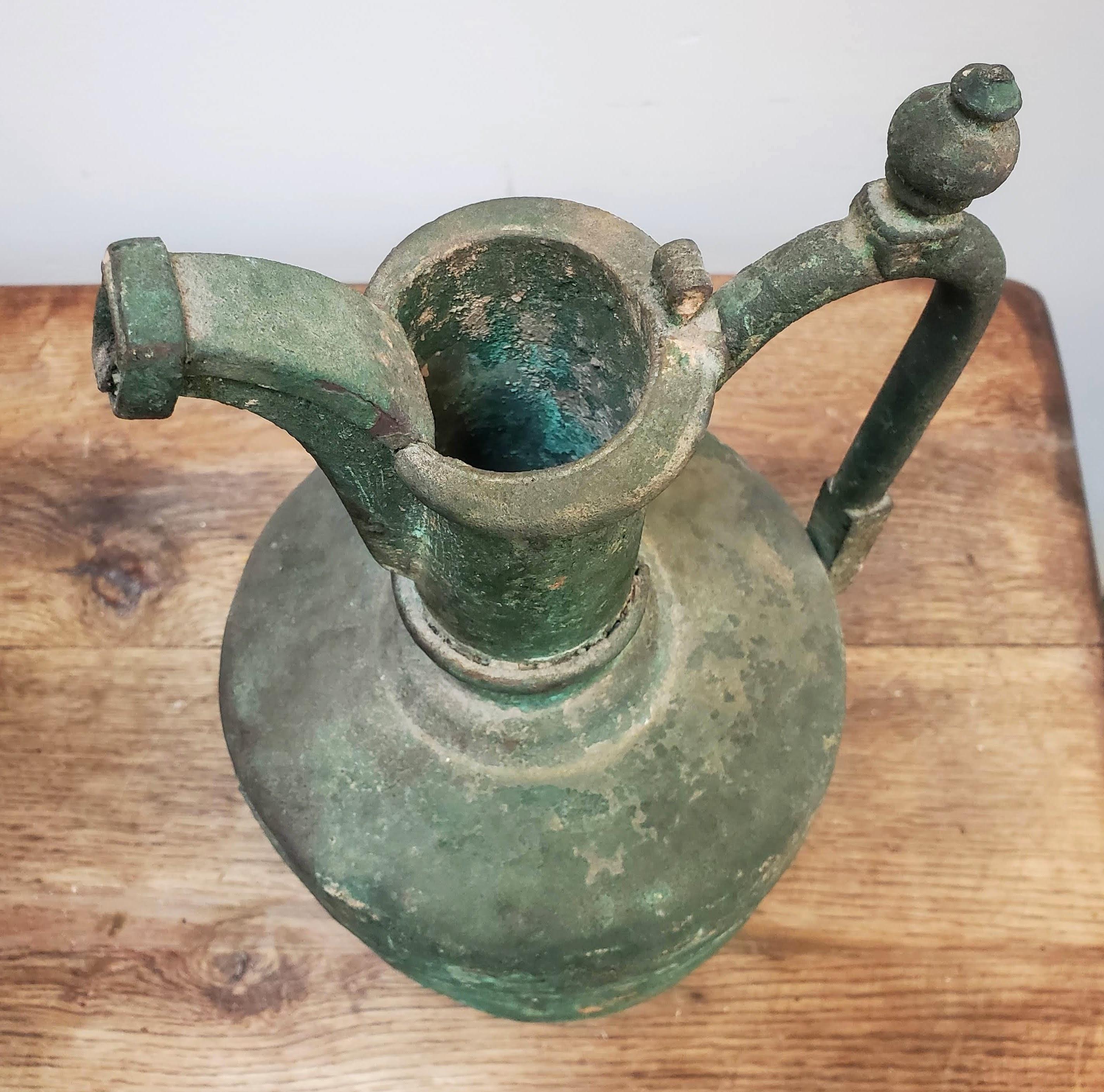13th Century Bronze Persian Wine Ewer with Decorative Handle In Good Condition In Middleburg, VA