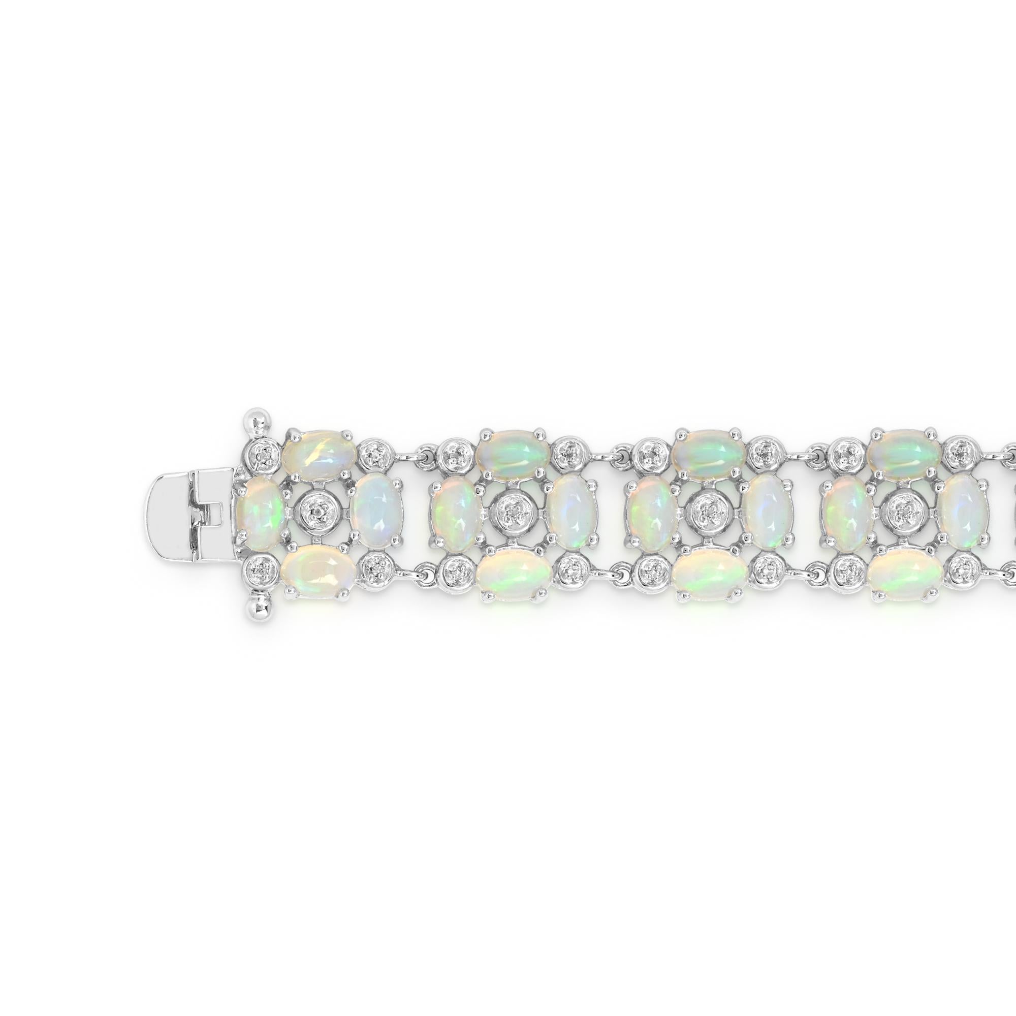 Oval Cut 14-7/8 Carat Oval Opal and White Topaz Sterling Silver Bracelet For Sale