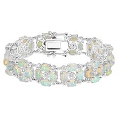 14-7/8 Carat Oval Opal and White Topaz Sterling Silver Bracelet