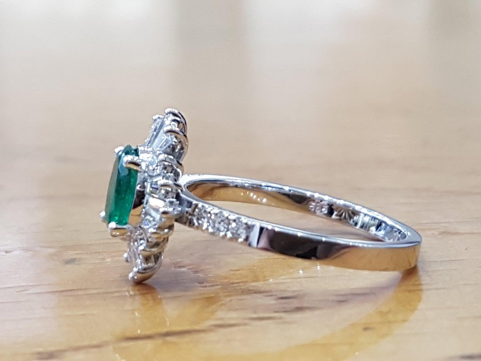 A beautiful handmade engagement ring made of 14K White Gold set with a large natural, light blue aquamarine accompanied with 0.5 total carat weight natural diamonds.
 
 Aquamarine Details
 Main Stone: Emerald Cut Aquamarine
  Color: Light Blue
 