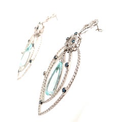 14 Carat Aquamarine/ light blue color/ 18kw Designer pear Diamond Earring