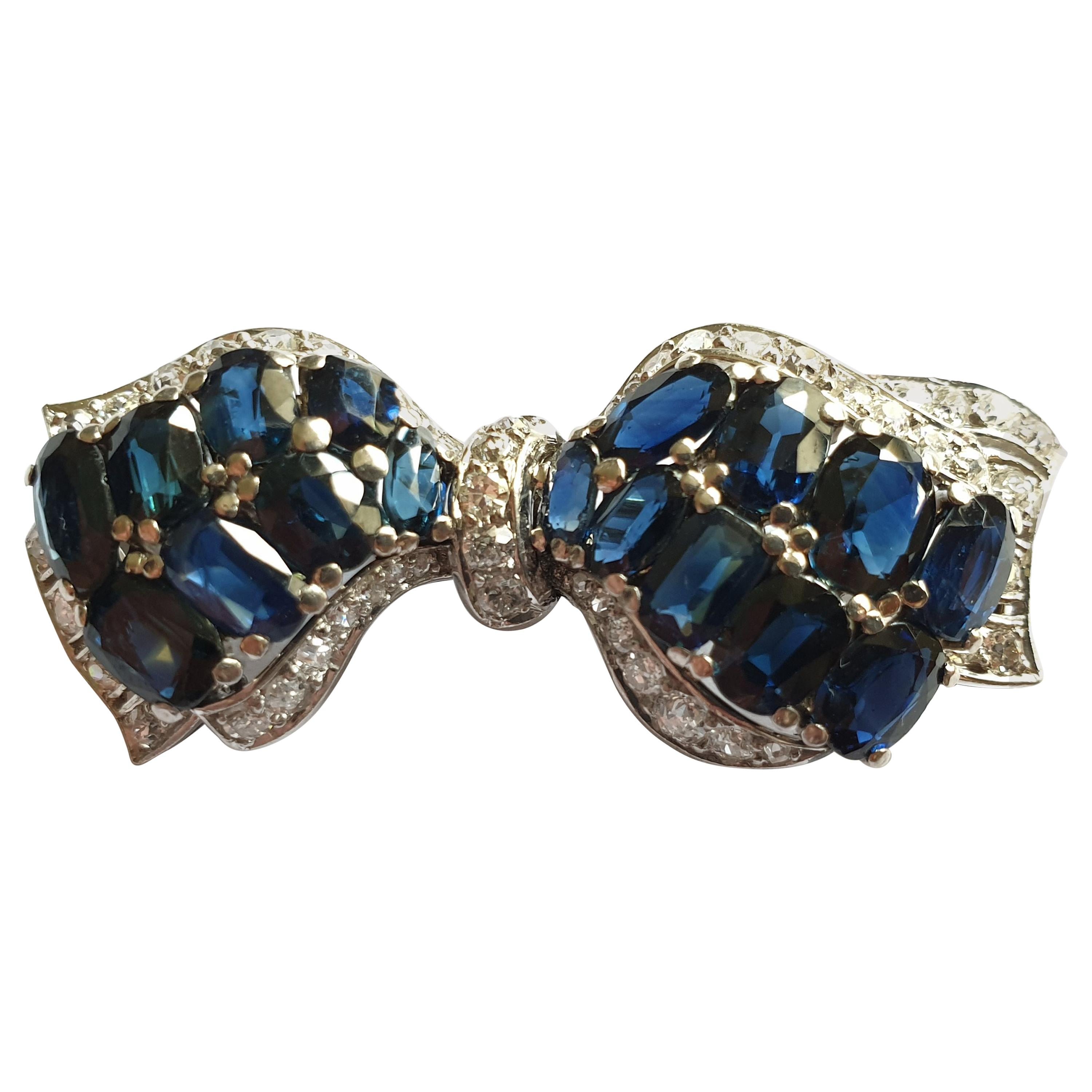 14 Carat Bow Brooch with Sapphires and Diamonds For Sale