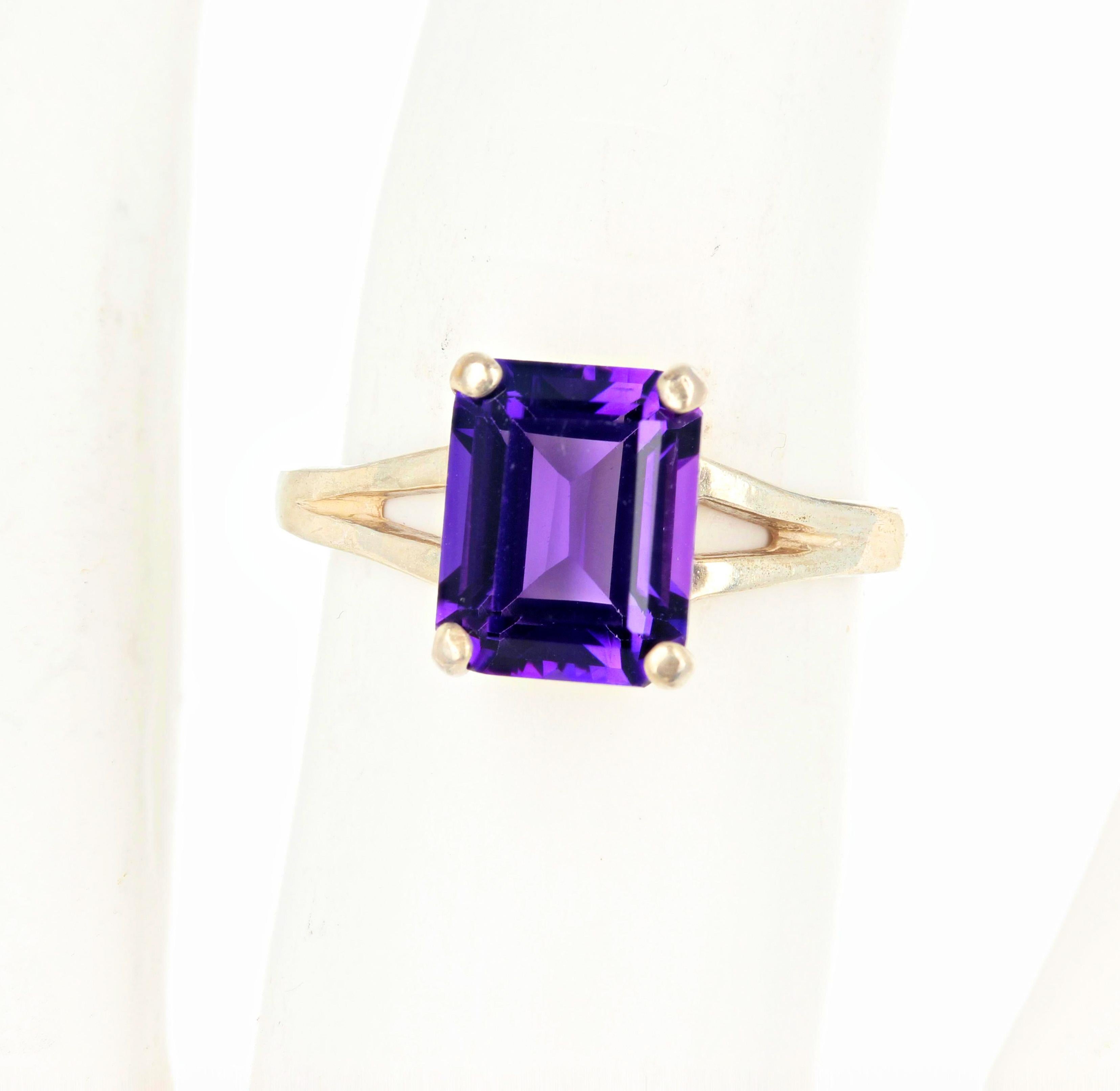 Absolutely glittering brilliant 1.4 carat natural purple Amethyst set in a sterling silver ring size 6.5 sizable.   It measures 9mm x 7mm approximately.  The spectacular optical effect in the Amethyst exhibits pinkypurple reflections and fire