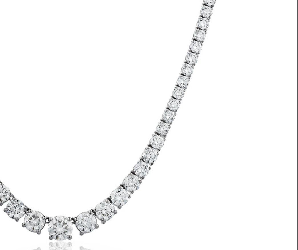 This amazing and large Riviera Necklace highlights a considerable total Diamond weight of 14 Carat in perfectly graduated Round Brilliant Cut gems with a sparkly white colour G and clarity SI1 eye clean, the biggest of which is 0.45 Carat. Each