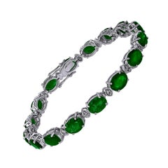 14 Carat Emerald 0.8 Carat Diamond Tennis Bracelet 18 Karat White Gold