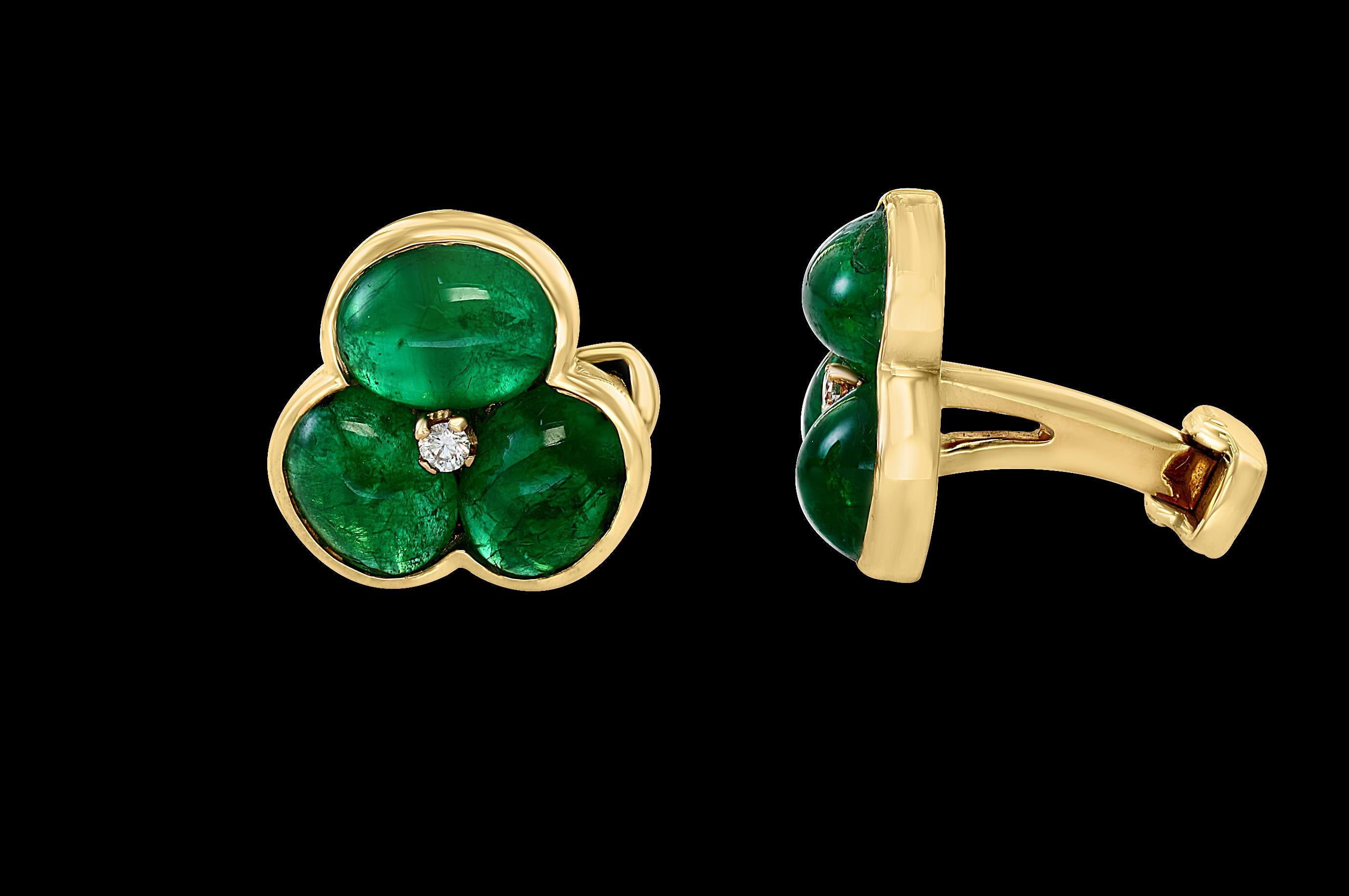 14 Carat Emerald Cabochon and Diamond 14 Karat Yellow Gold Cufflinks
The epitome of subtle elegance, these cabochon gemstone cufflinks are the perfect everyday piece for any occasion --from days at the office to dinner parties and black tie events.