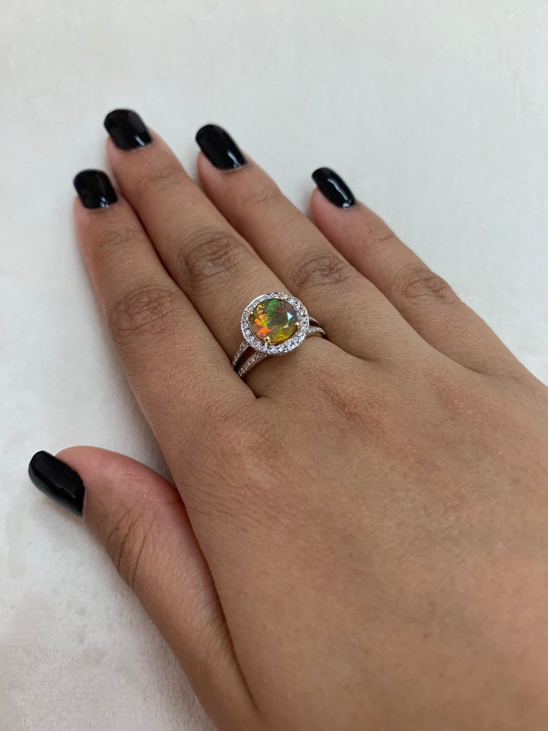 Round Cut 1.4 Carat Ethiopian Opal with Diamond Ring in 18 Karat Yellow Gold For Sale