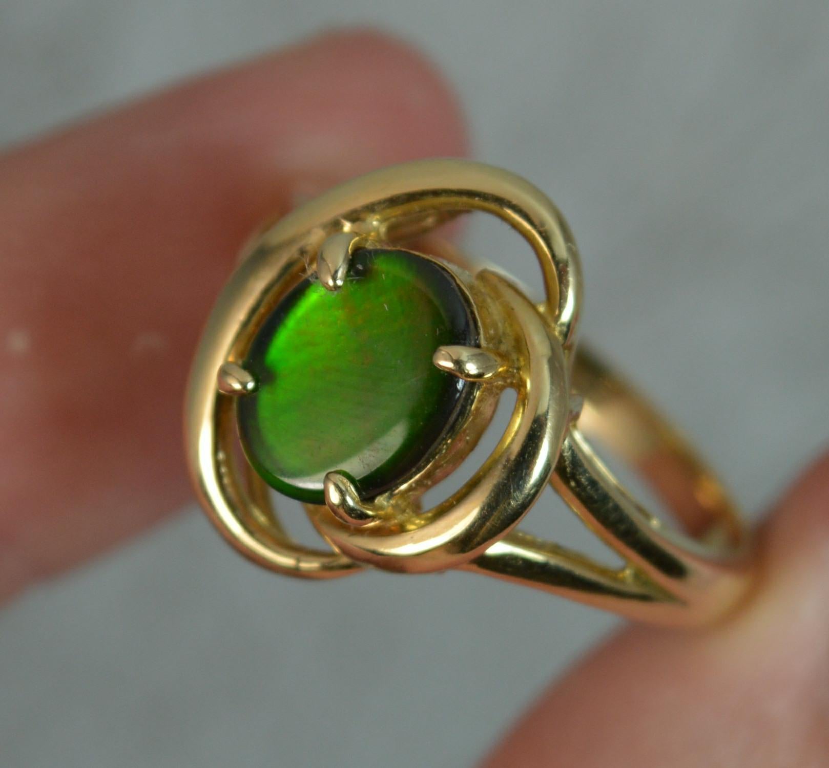 Oval Cut 14 Carat Gold Ammolite Solitaire Ring