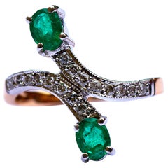 14 Carat Gold, Emerald and Diamond Cross over / Bypass Ring