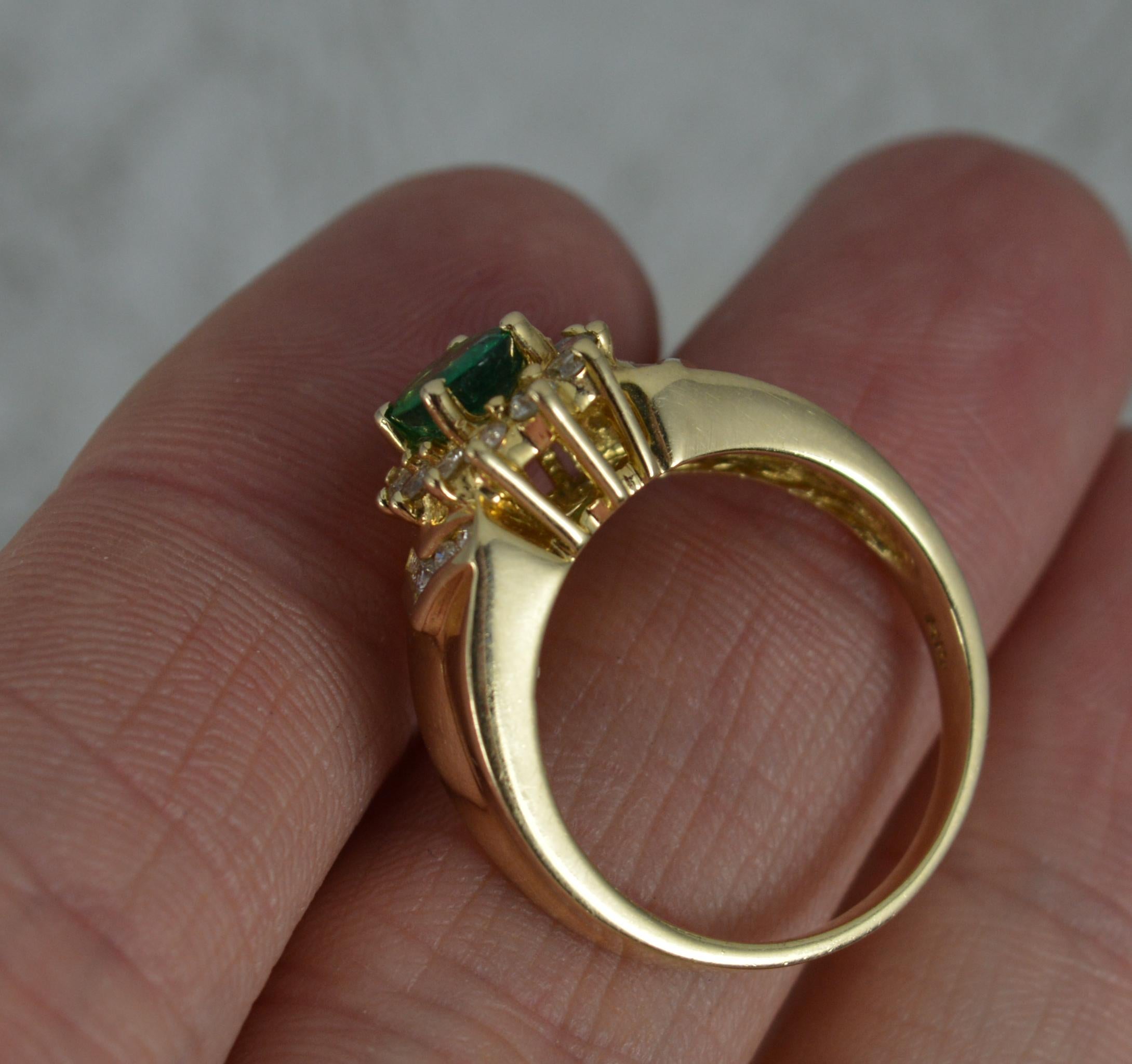 Contemporary 14 Carat Gold Oval Emerald and Diamond Cluster Ring