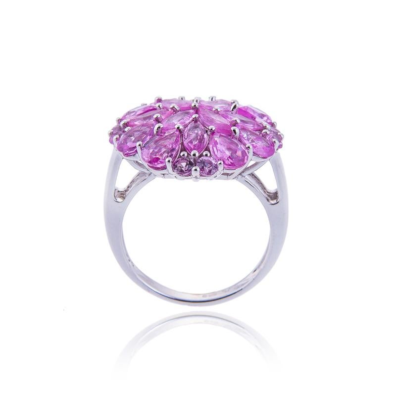 An 14 ct white gold unique and stylish ring surrounded by galaxy of precious pink sapphires. Ideally suitable for party or any special occasion.

Could be a perfect wedding anniversary present to your lady.

Item Code: CJR1049

Pink Sapphires: 6.50