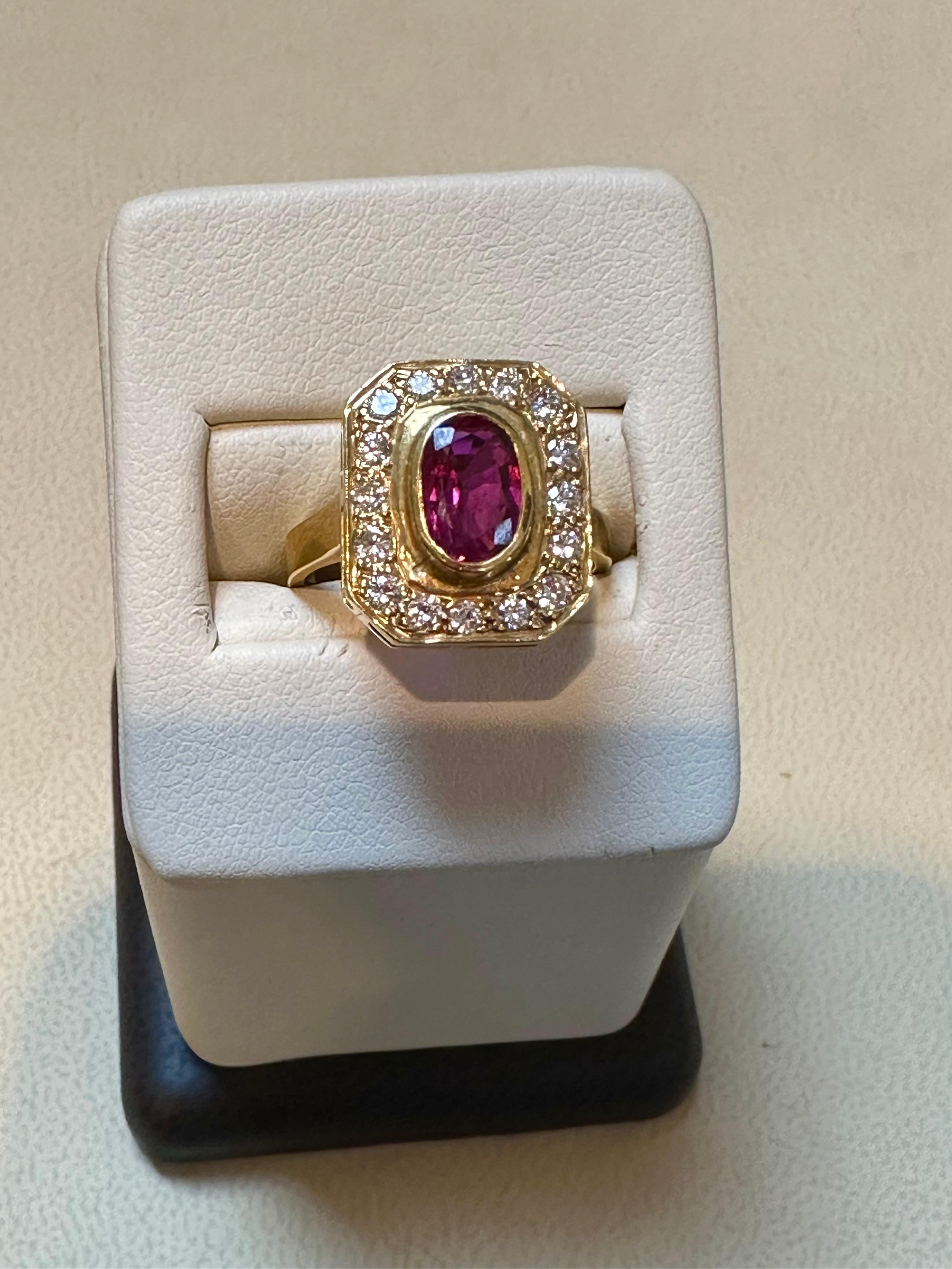Oval Cut 1.4 Carat Natural Oval  Ruby and 0.80 Carat Diamond 18 Karat Gold Ring For Sale