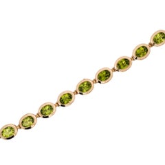 Pulsera de eslabones de oro de 14K con peridoto ovalado engastado en bisel de 14 quilates, 7"