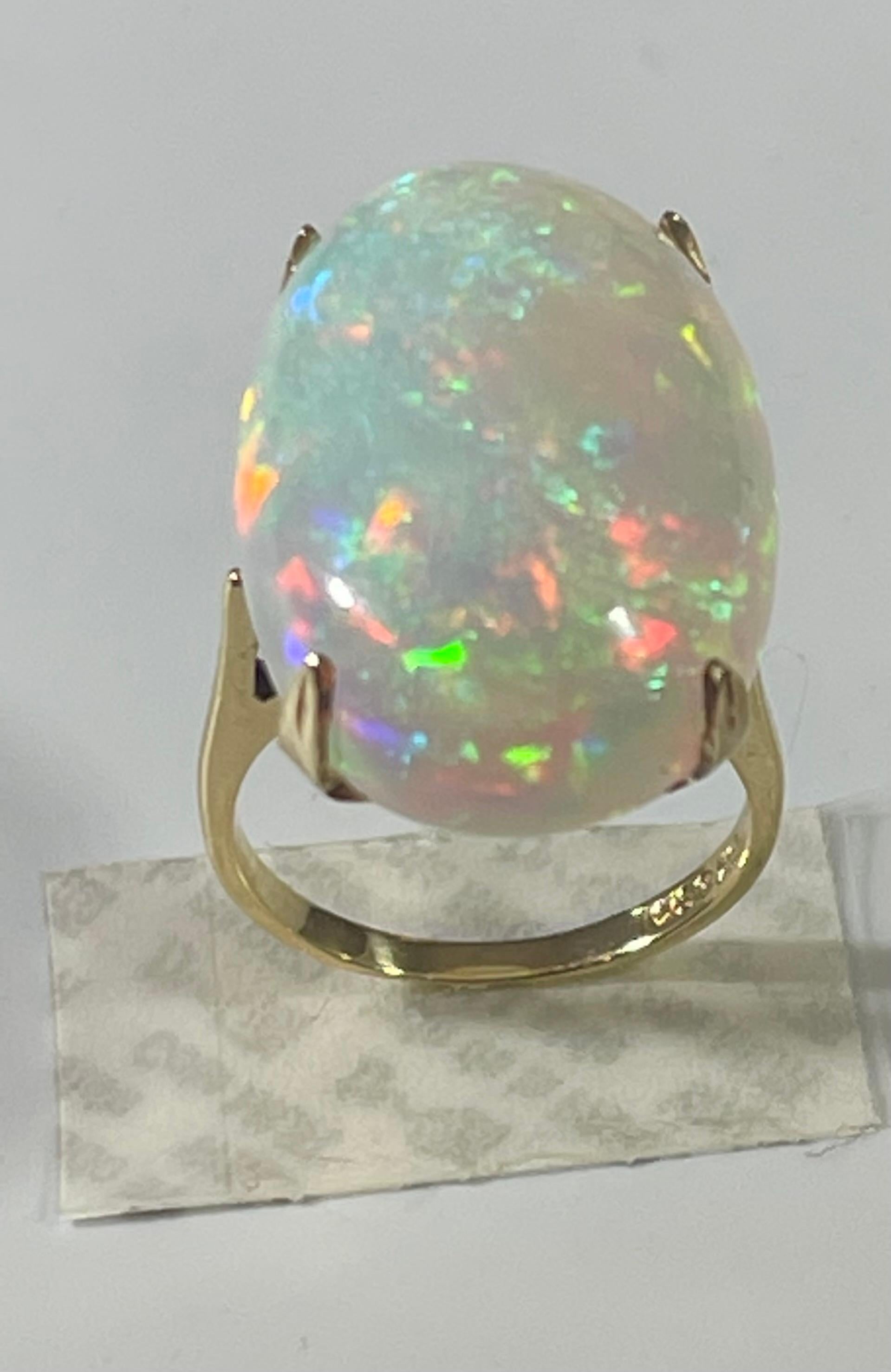 Women's 14 Carat Oval Shape Ethiopian Opal Cocktail Ring 14 Karat Yellow Gold For Sale