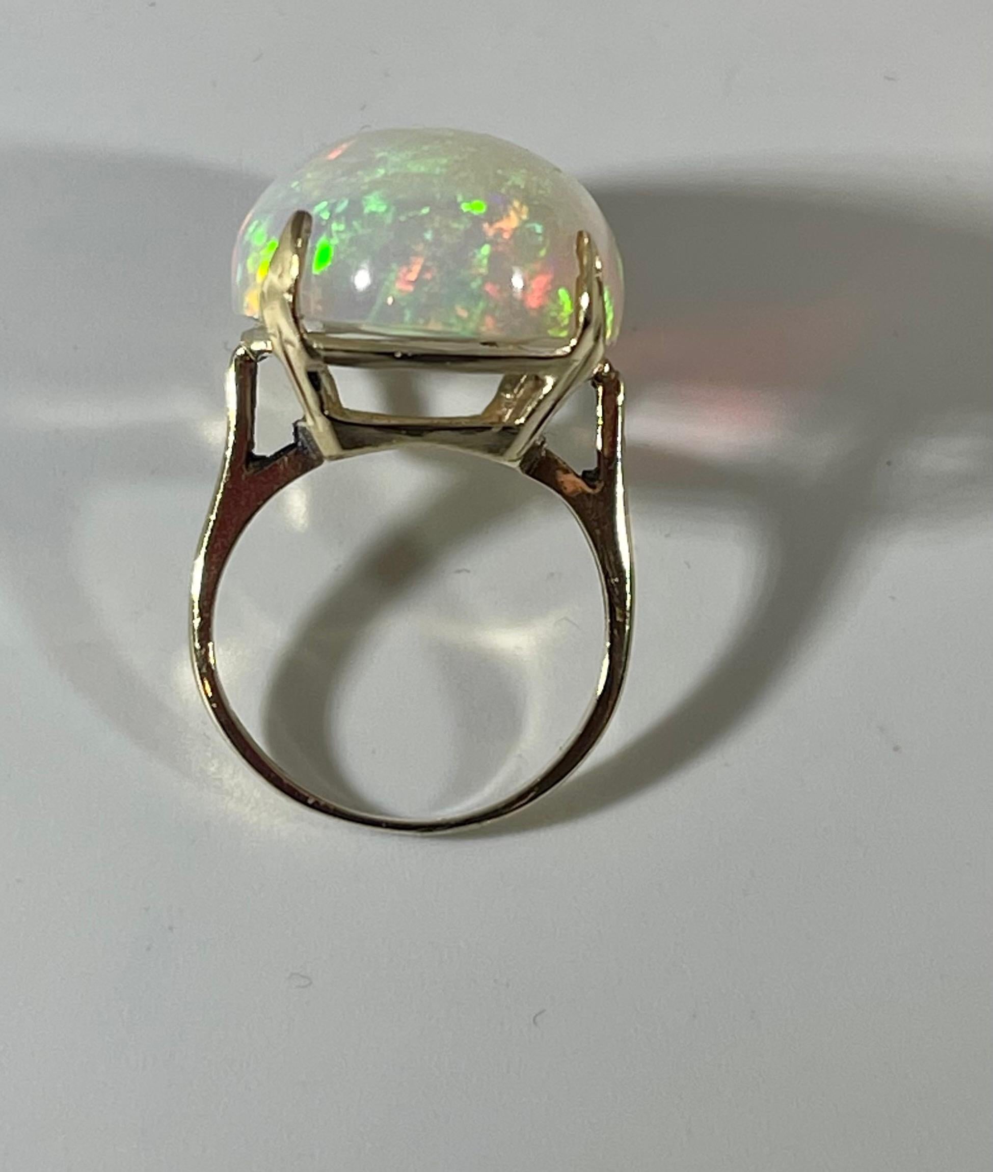 14 Carat Oval Shape Ethiopian Opal Cocktail Ring 14 Karat Yellow Gold For Sale 3