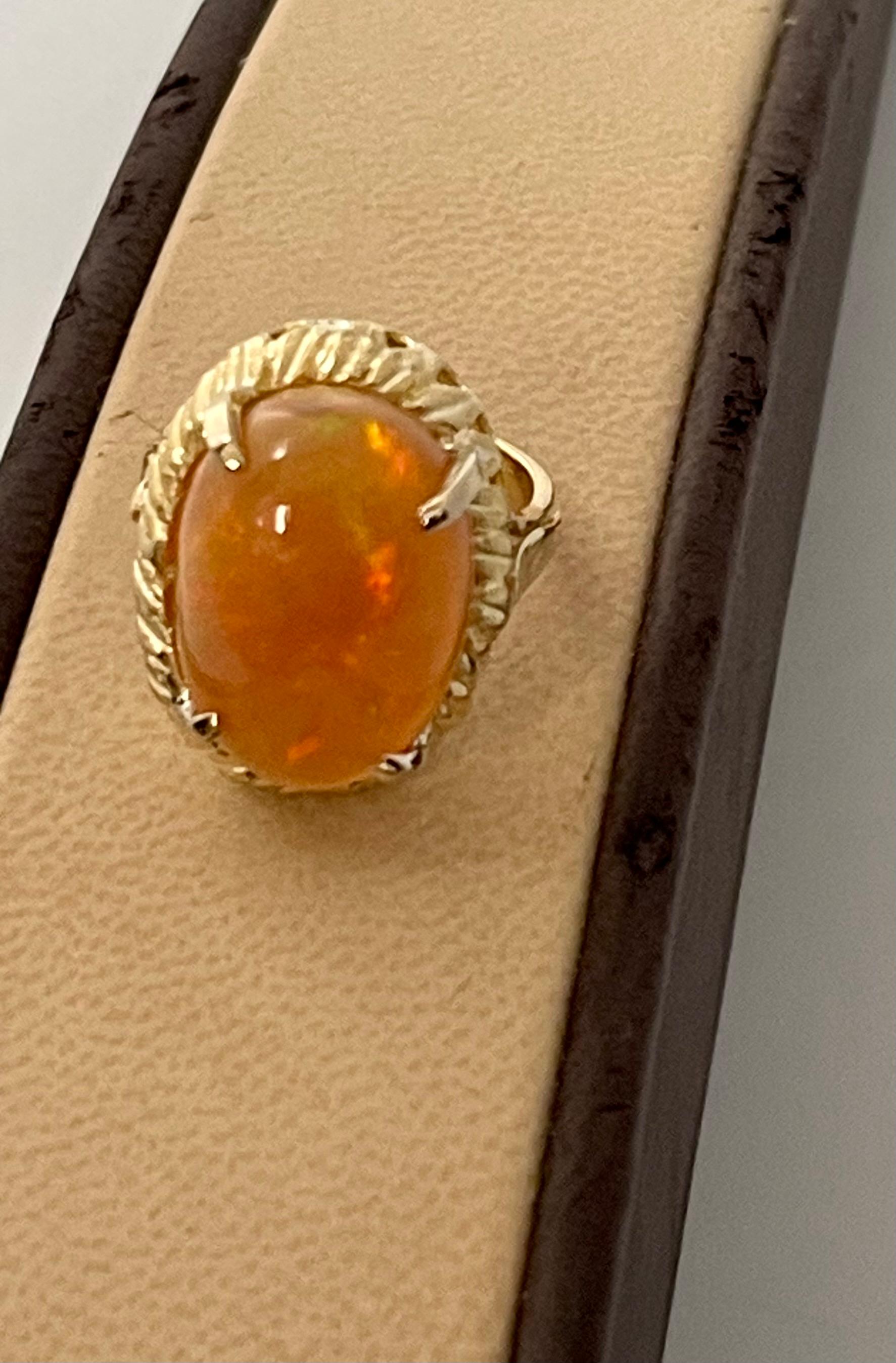 14 Carat Oval Shape Ethiopian Opal Cocktail Ring 14 Karat Yellow Gold Solid Ring In Excellent Condition For Sale In New York, NY