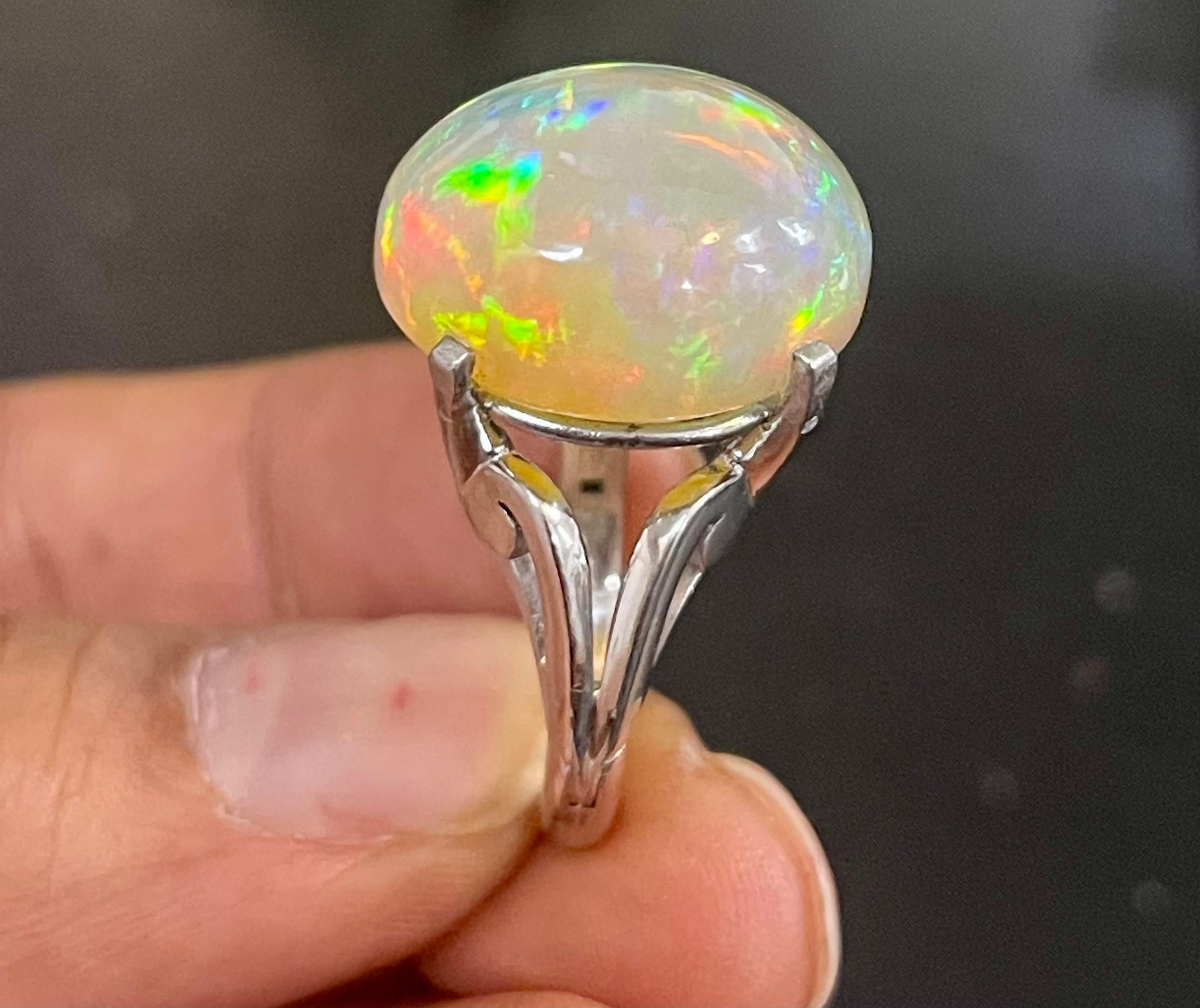 14 Carat Oval Shape Ethiopian Opal Cocktail Ring in Platinum For Sale 3