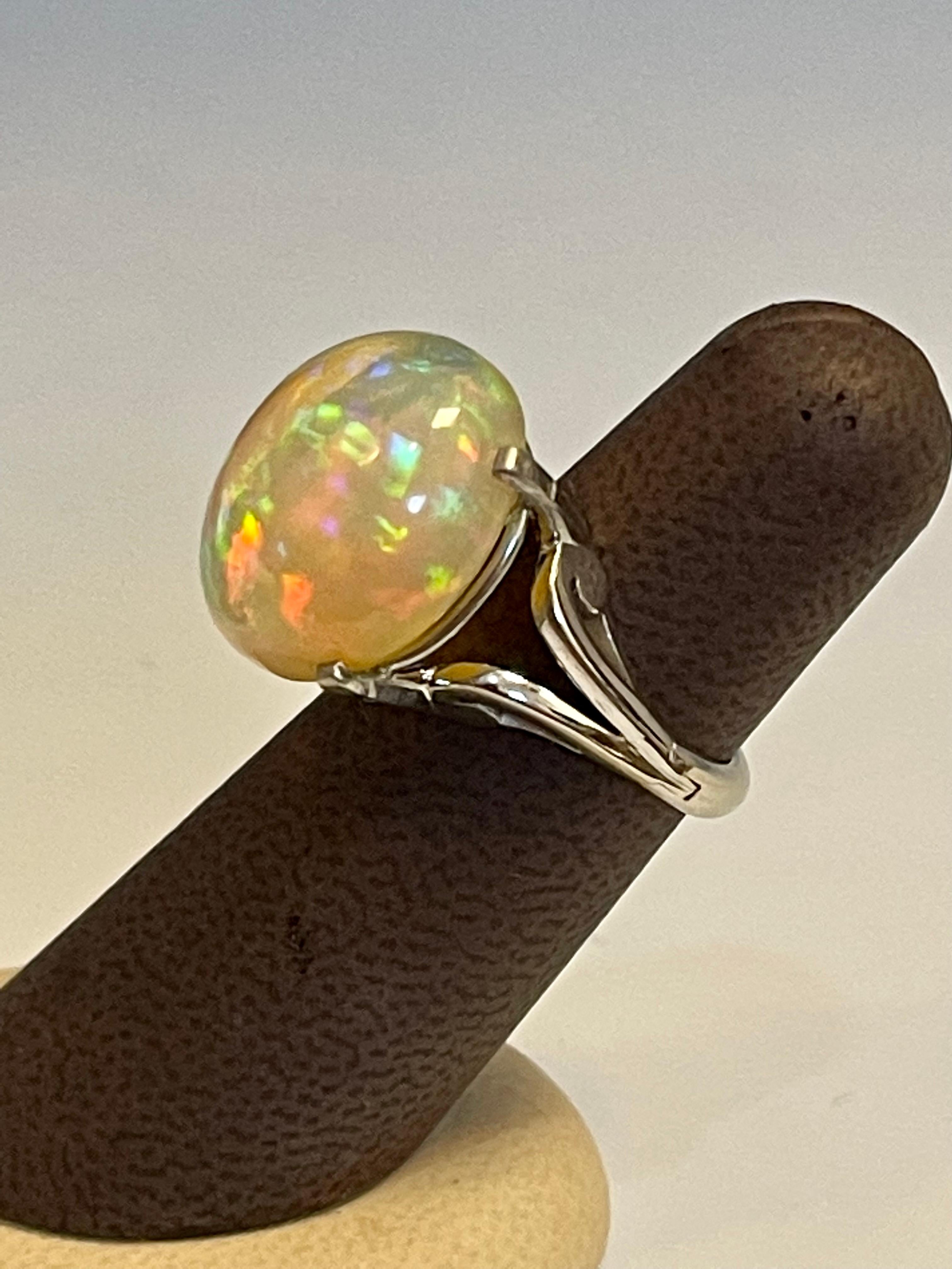 14 Carat Oval Shape Ethiopian Opal Cocktail Ring in Platinum For Sale 4