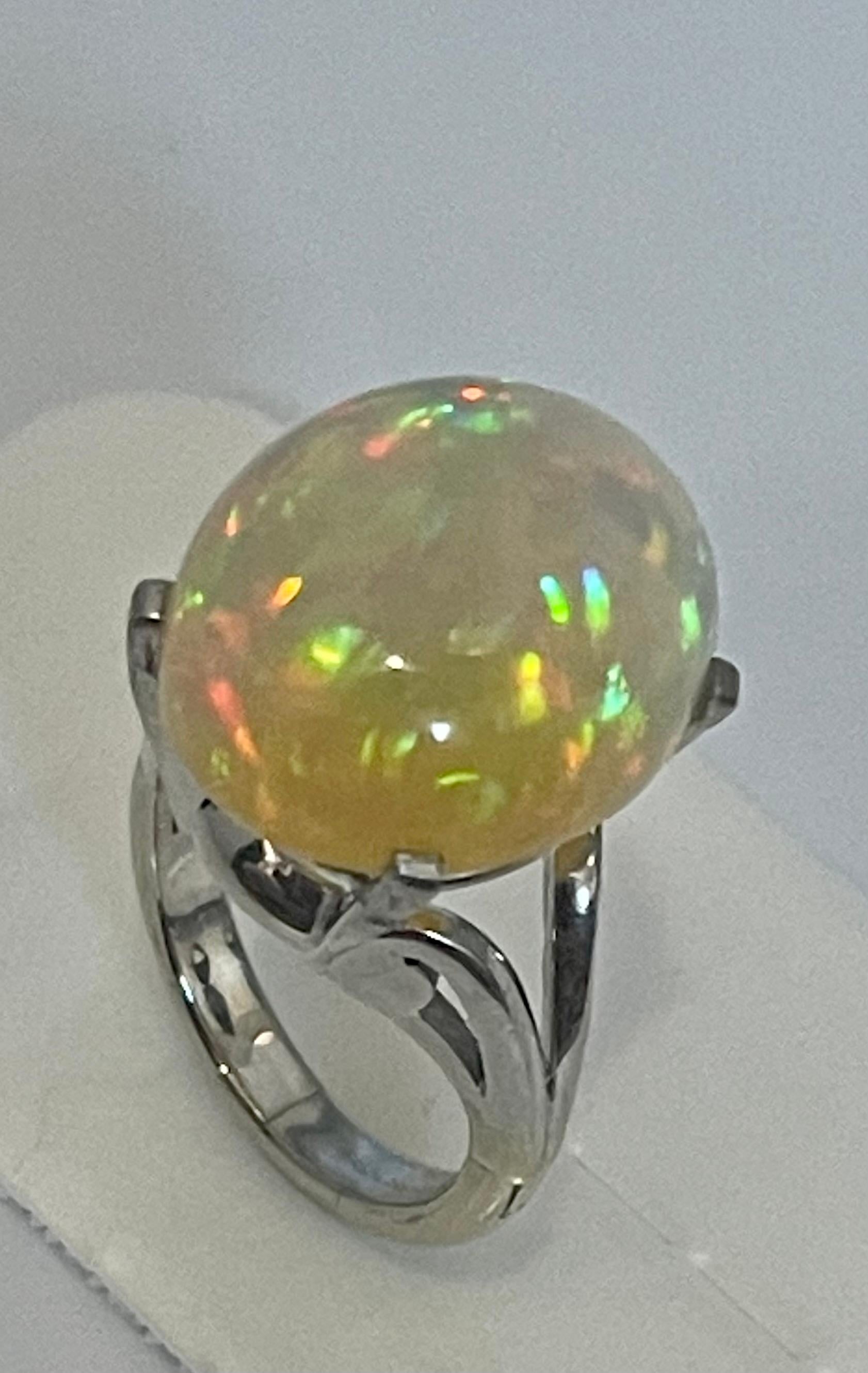 14 Carat Oval Shape Ethiopian Opal Cocktail Ring in Platinum For Sale 7