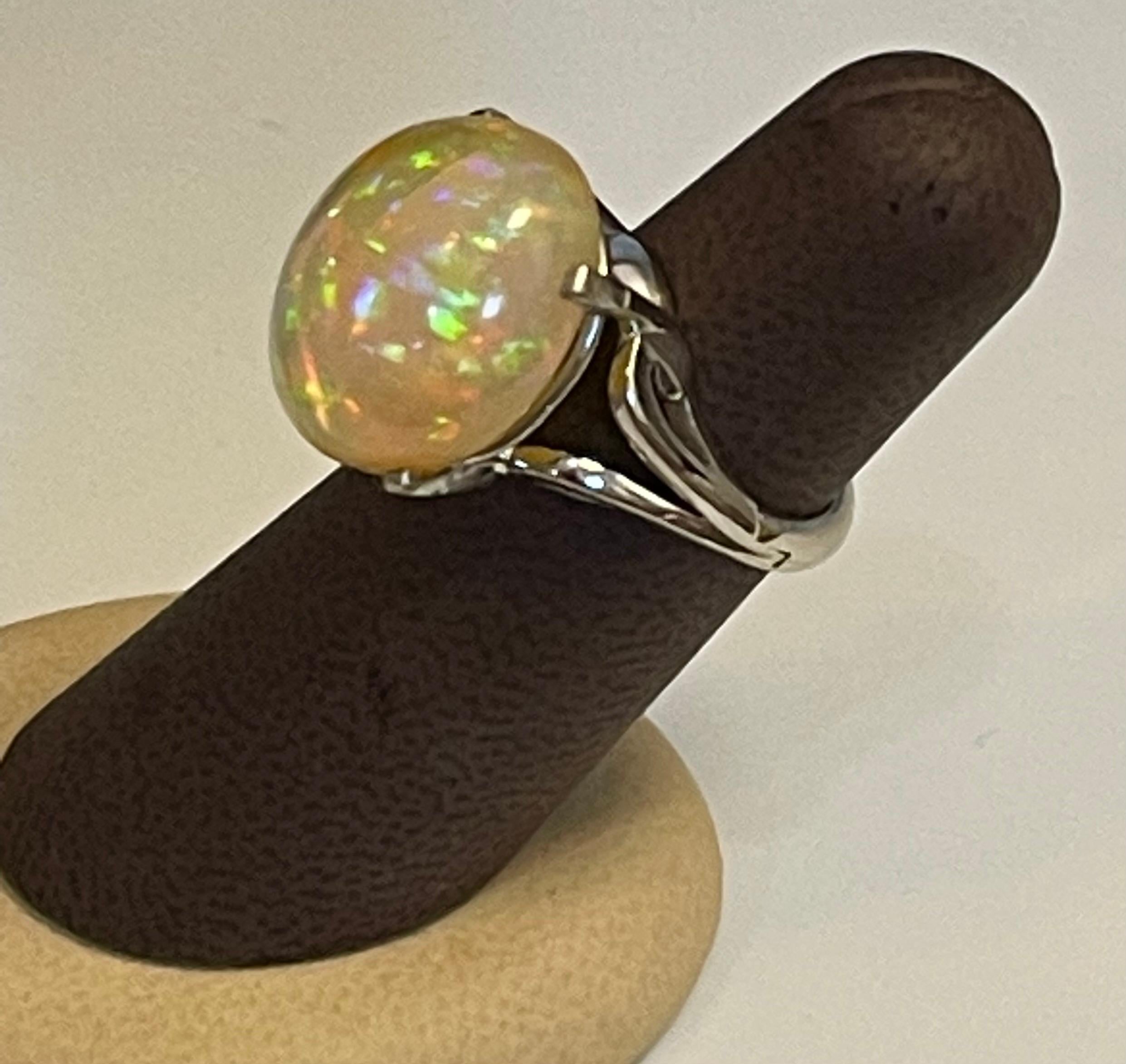 Oval Cut 14 Carat Oval Shape Ethiopian Opal Cocktail Ring in Platinum For Sale
