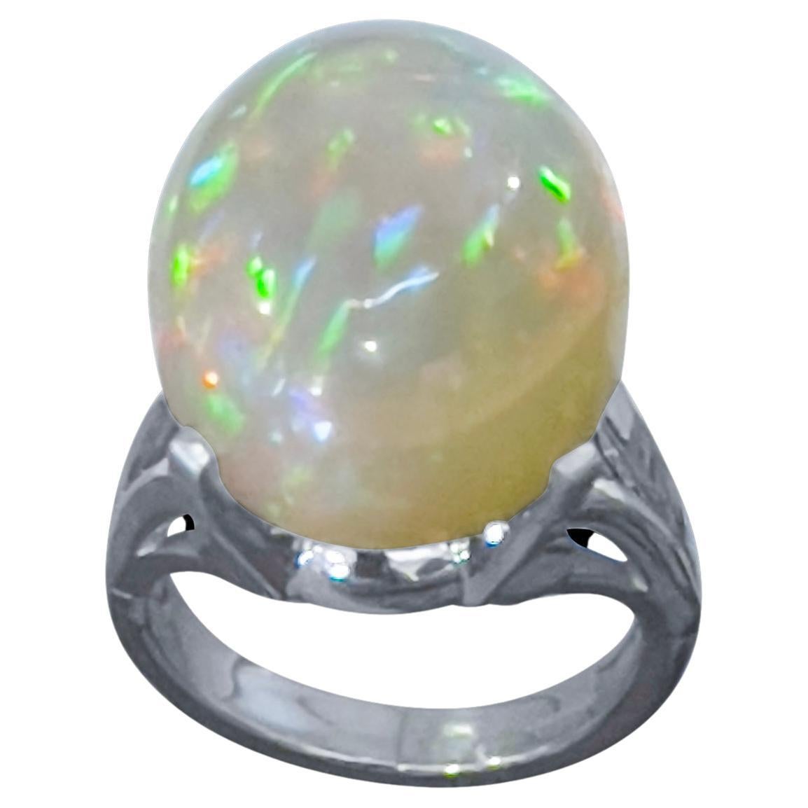 14 Carat Oval Shape Ethiopian Opal Cocktail Ring in Platinum For Sale