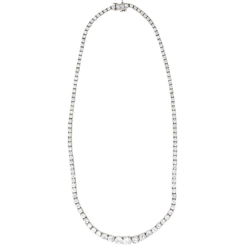 Riviera style necklace comprised of round brilliant cut diamonds weighing approximately 14.00 carats; H/I color and VS clarity

Diamonds are carefully prong set as individual articulated baskets that graduate in size

Largest central diamond weighs