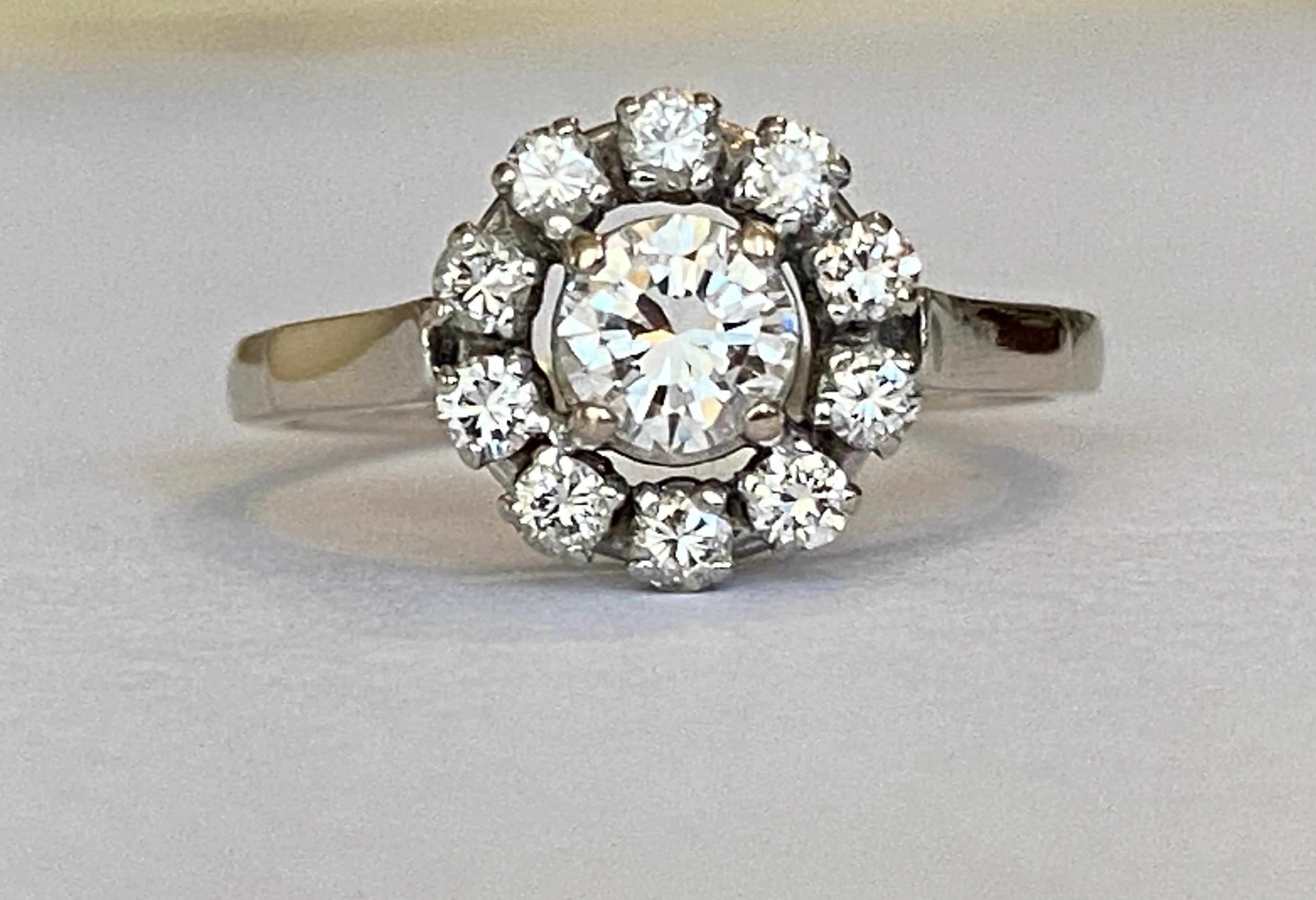 Brilliant Cut 14 carat vintage white gold rosette ring with 0.83 ct diamonds For Sale