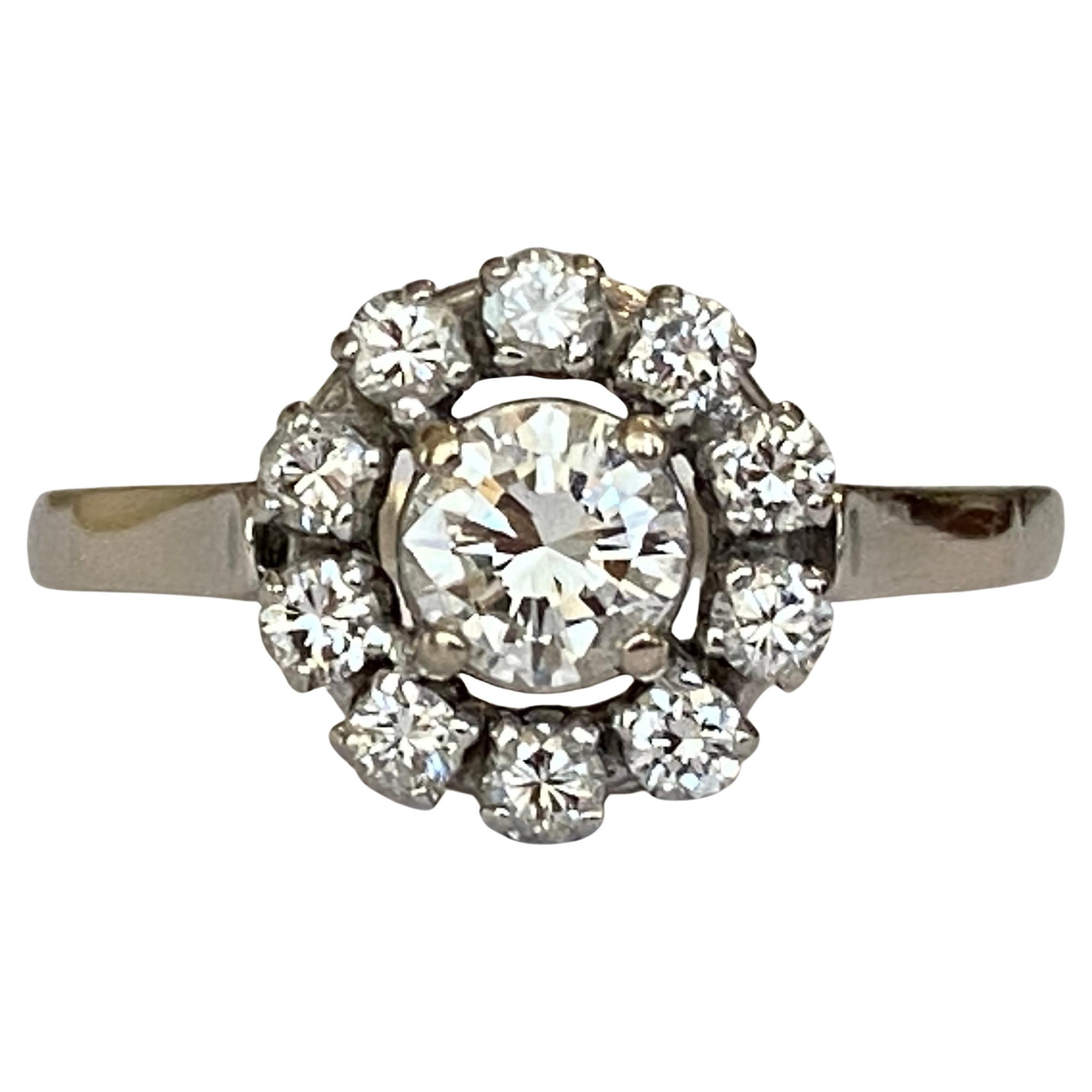 14 carat vintage white gold rosette ring with 0.83 ct diamonds