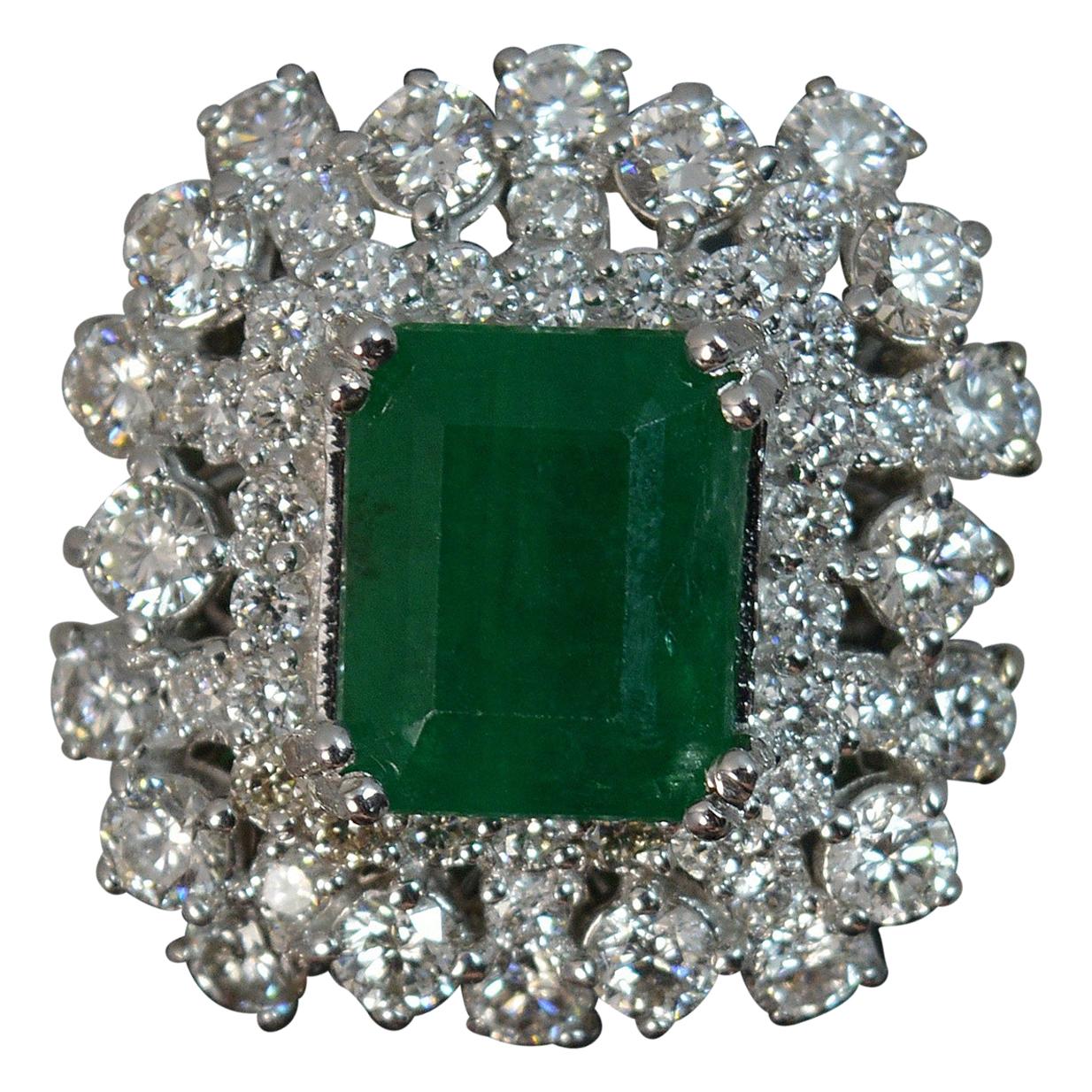 14 Carat White Gold Emerald VS1 2.25 Carat Diamond Cluster Ring