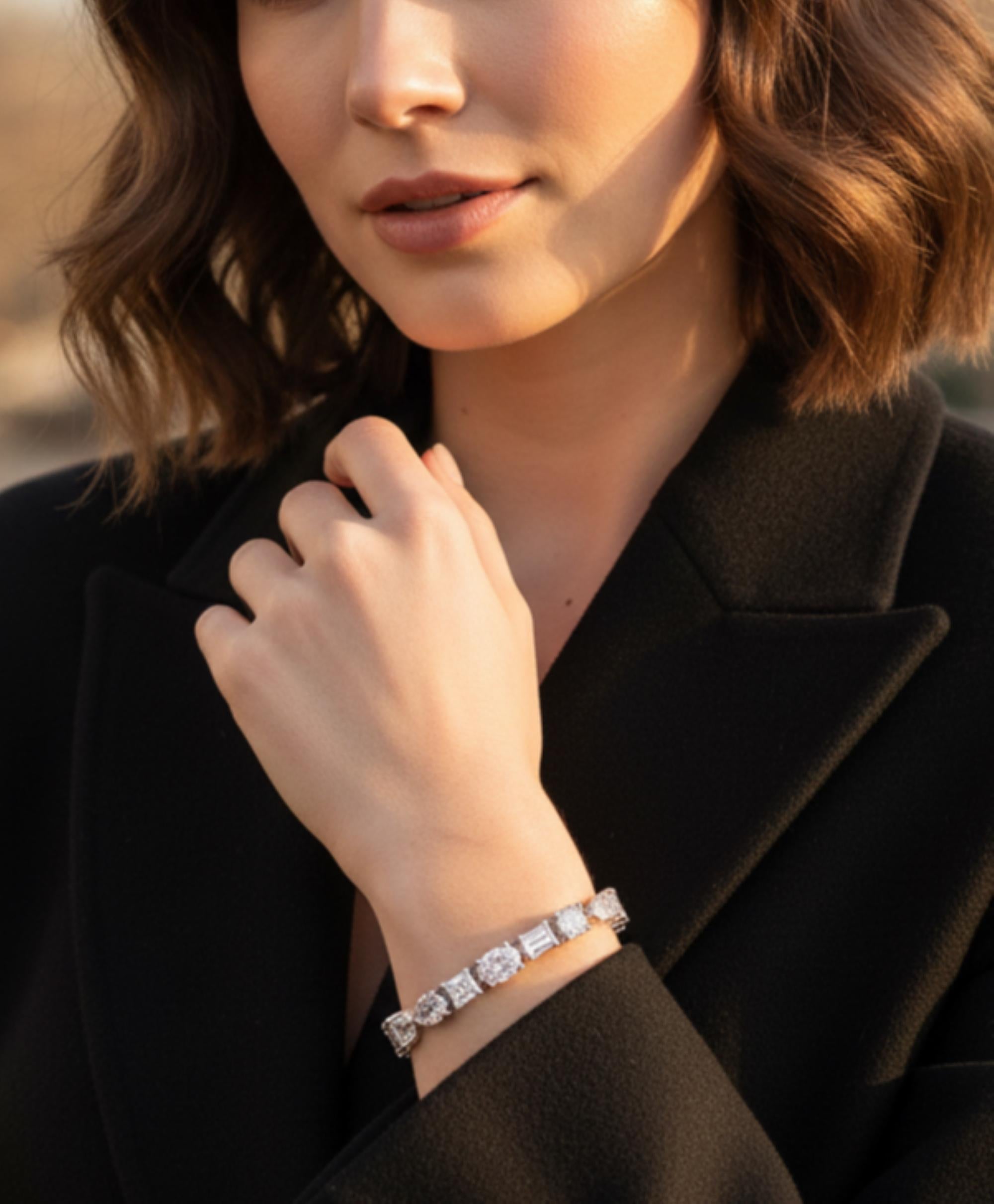 14 Karat Weißgold Gemischter Schliff 11,21 Karat Naturdiamant Tennis Hochzeitsarmband.
Dieses luxuriöse Armband zeichnet sich durch eine kunstvolle Anordnung von Diamanten in verschiedenen Schliffen aus - oval, birnenförmig, smaragdgrün,