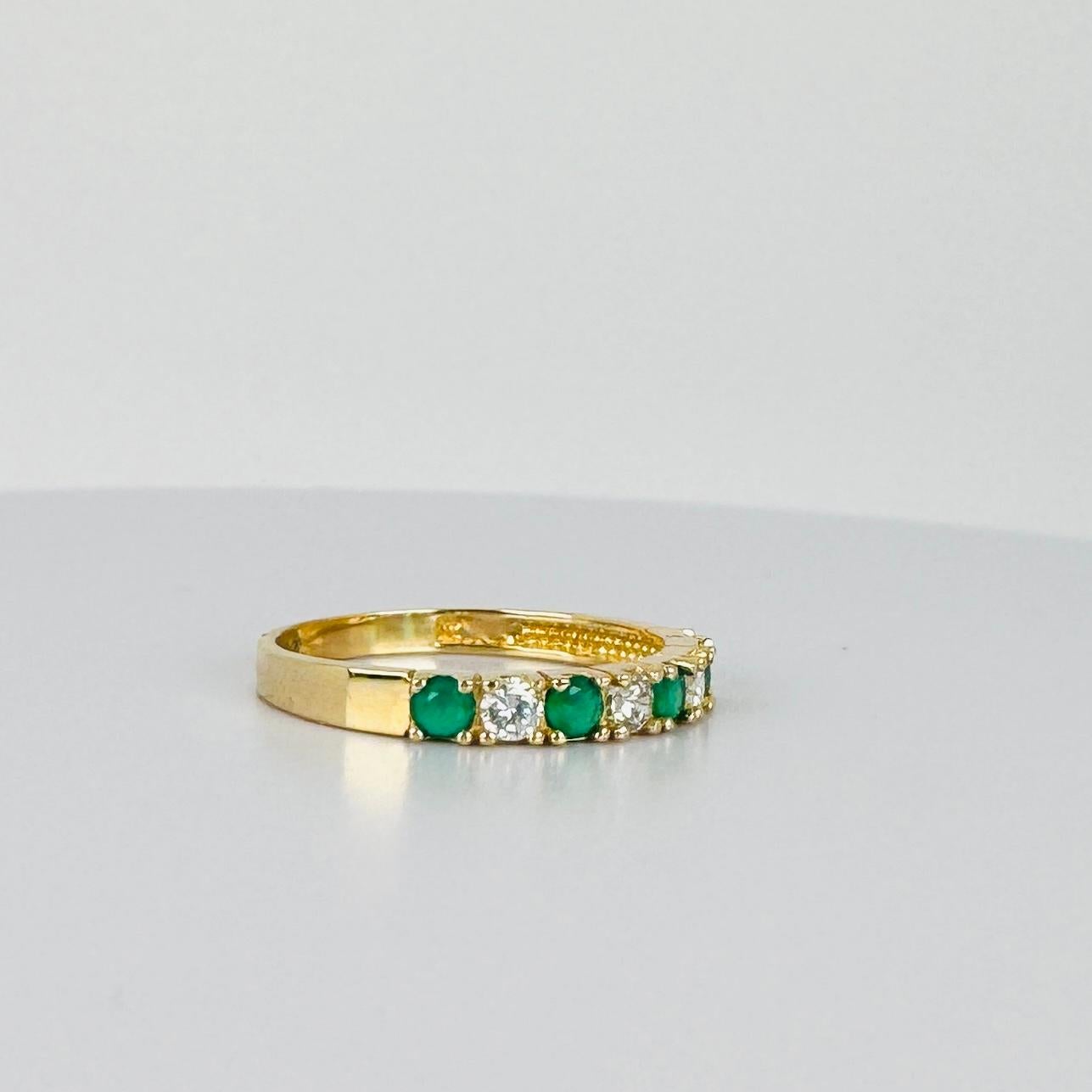 14 carat yellow gold bang ring with white sapphires and emerald 0.16 carat For Sale 3
