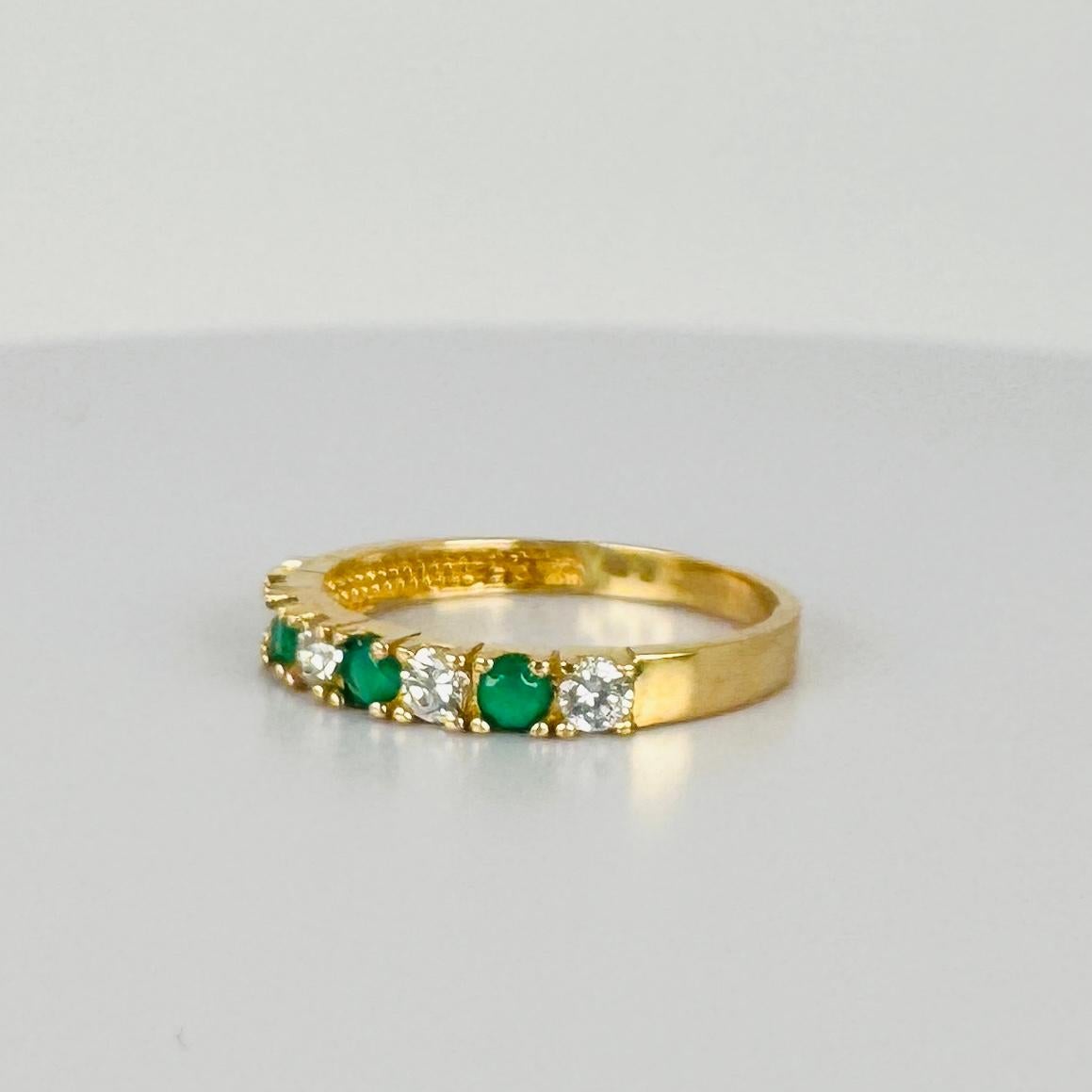 14 carat yellow gold bang ring with white sapphires and emerald 0.16 carat For Sale 2