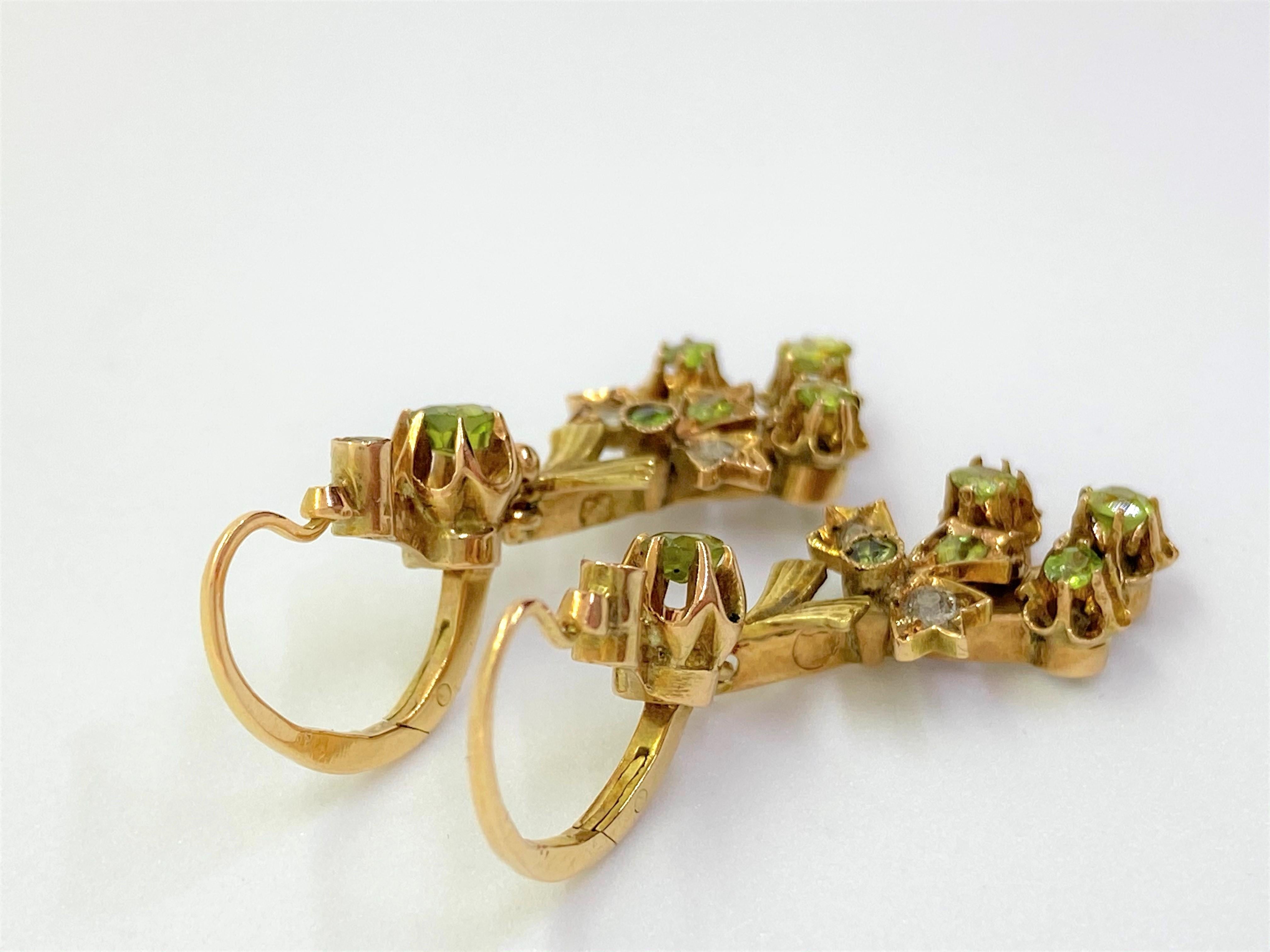 14 Karat Yellow Gold Demantoid Garnet Rosecut Diamond Earrings
Width 1.1 cm, Length 3.5 cm, Depth 1.3cm
14k gold, Russian gold stamp 56
