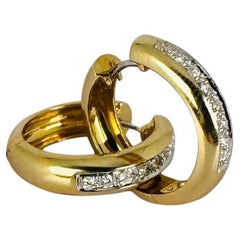 Earrings 14k Yellow Gold with 16 Brilliant Cut Diamonds of 0.64 carat Clarity SI