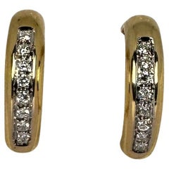 Boucles d'oreilles or jaune 14 carats taille brillant 16 diamants pureté si 0.64 carat