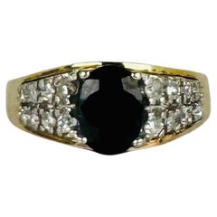 Anello in oro giallo 14k zaffiro blu ovale 0,4 ct diamanti taglio brillante 0,16 ct
