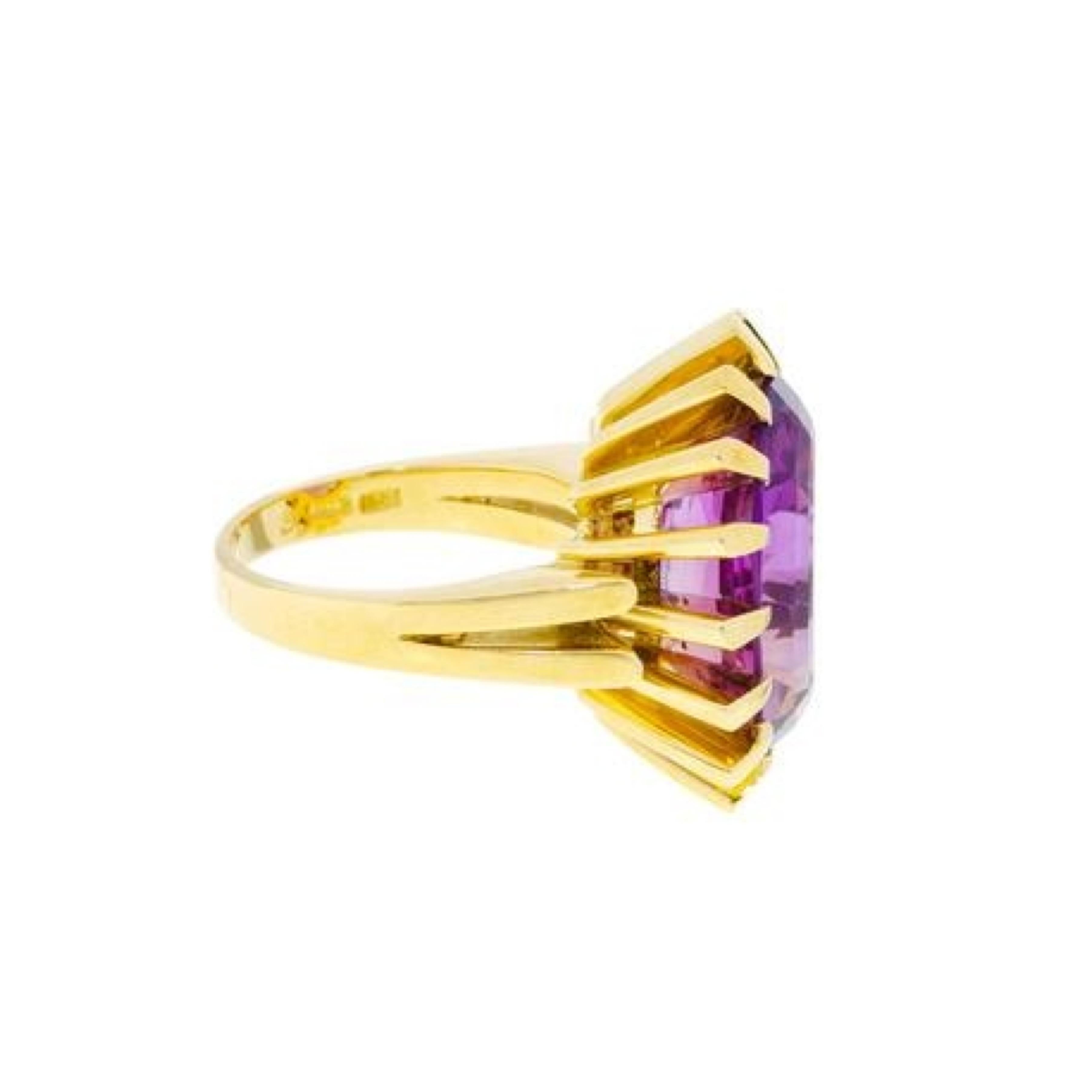 Beautiful yellow gold ring set with an oval cut amethyst. Beautiful and original modernist frame with 16 prongs.

Estimated weight of the amethyst: 14 carats

Dimensions : 21.48 x 26.05 x 11.09 mm (0.845 x 1.025 x 0.436 inch)

Finger size: 56.5 (US: