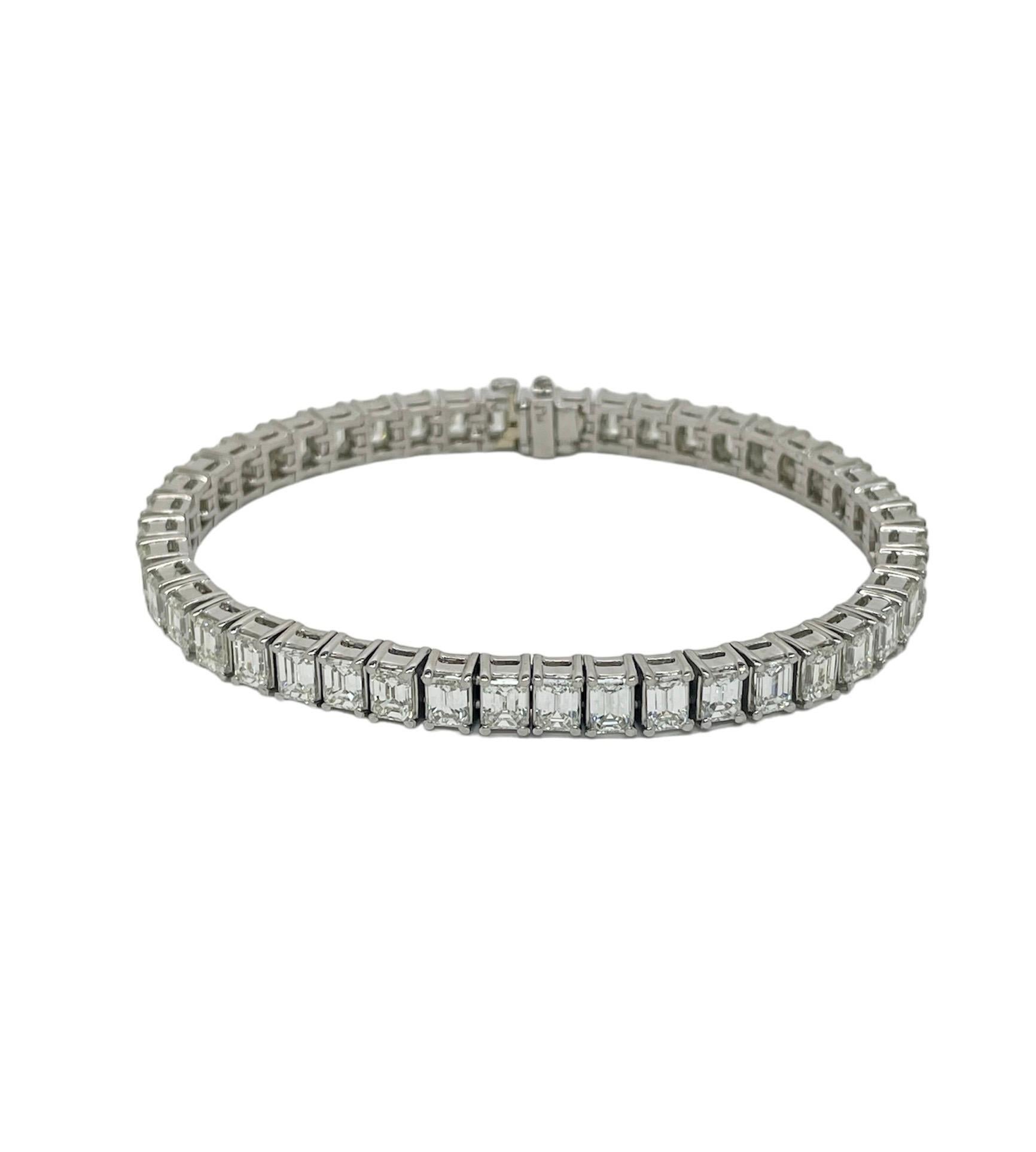 This super classic bracelet contains 45 emerald cut diamonds weighing approximately 14.00 carats total. Crafted in platinum, this bracelet is extremely well made and a perfect addition to your collection.

Stamp: PLT.
Material: Platinum
Gross