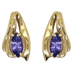 Rehausseurs de collier en or jaune avec tanzanite de 1,4 carat