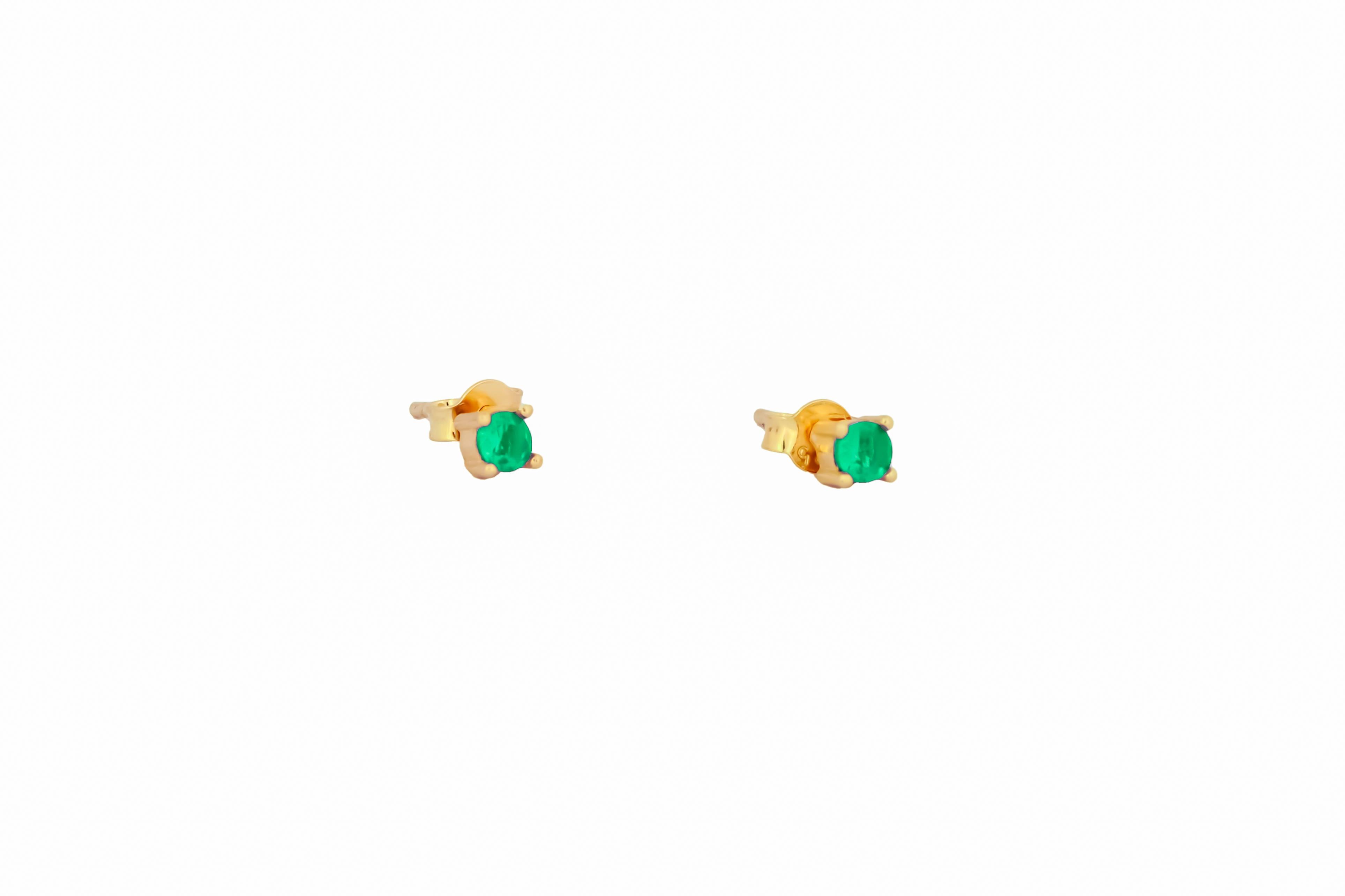 14 ct Gold Lab Emerald Stud Earrings.  
3 mm emerald earrings. Green gemstone earrings. Small delicate gold earrings studs. Four prong studs. Minimalist emerald earrings.

Metal: 14k solid gold
Weight: 1.5 gr.
Earrings goes with gold