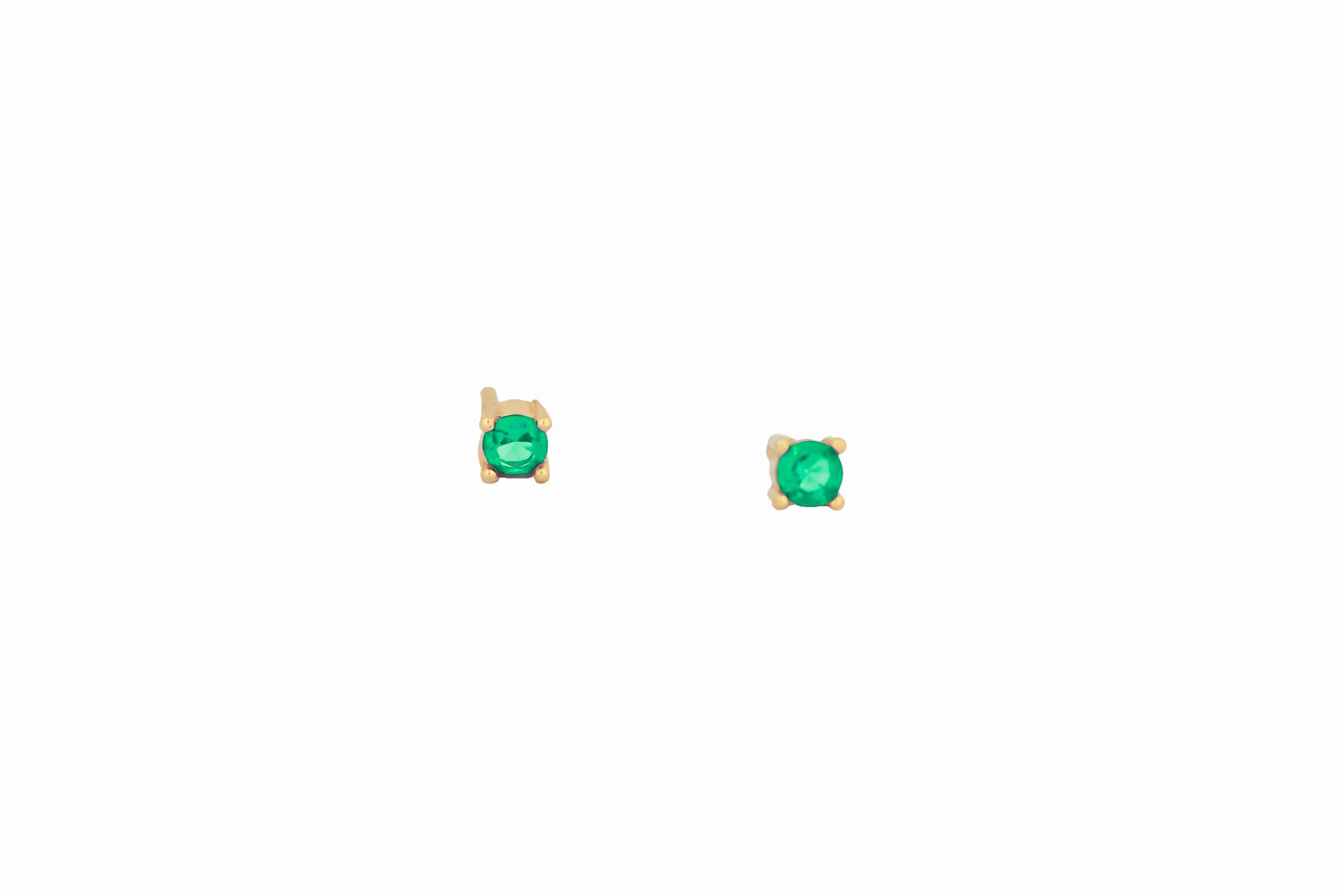 Modern 14 ct Gold Lab Emerald Stud Earrings.   For Sale