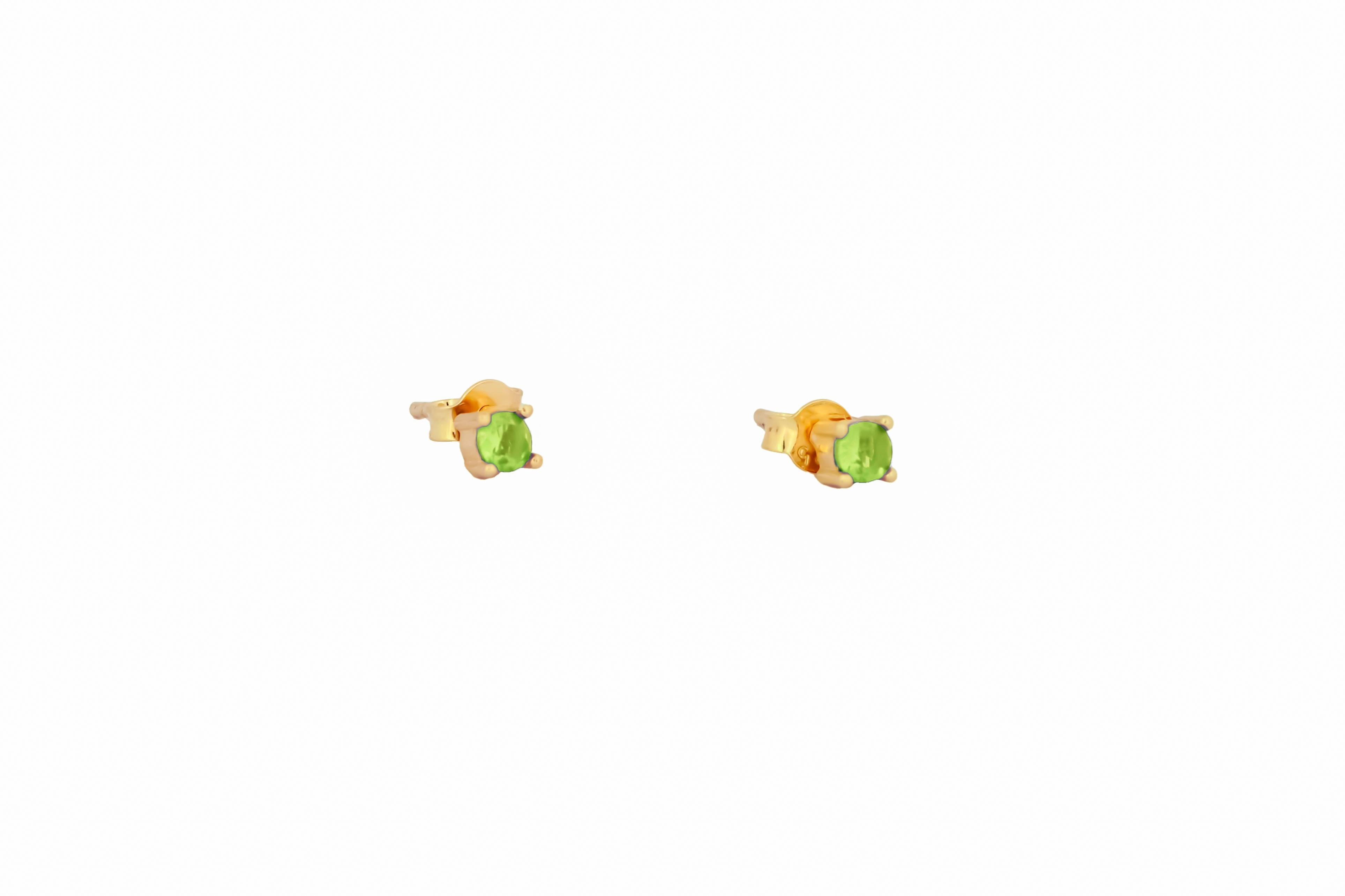 14 ct Gold Lab Peridot Stud Earrings.  
3 mm peridot earrings. Green gemstone earrings. Small delicate gold earrings studs. Four prong studs. Minimalist peridot earrings.

Metal: 14k solid gold
Earrings goes with gold clasps

Gemstones:
2 green