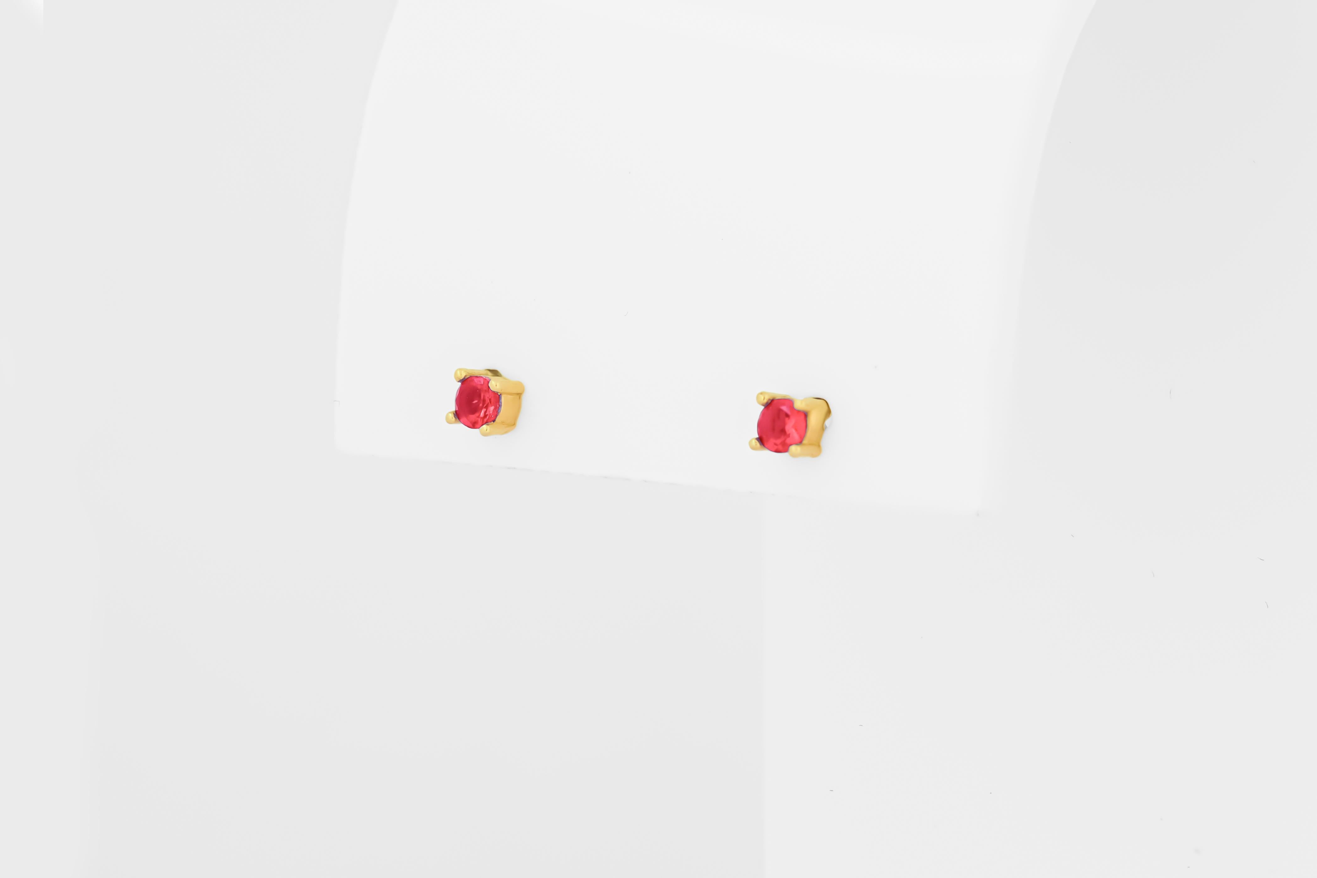 14 ct Gold Lab Ruby Stud Earrings.   For Sale 1