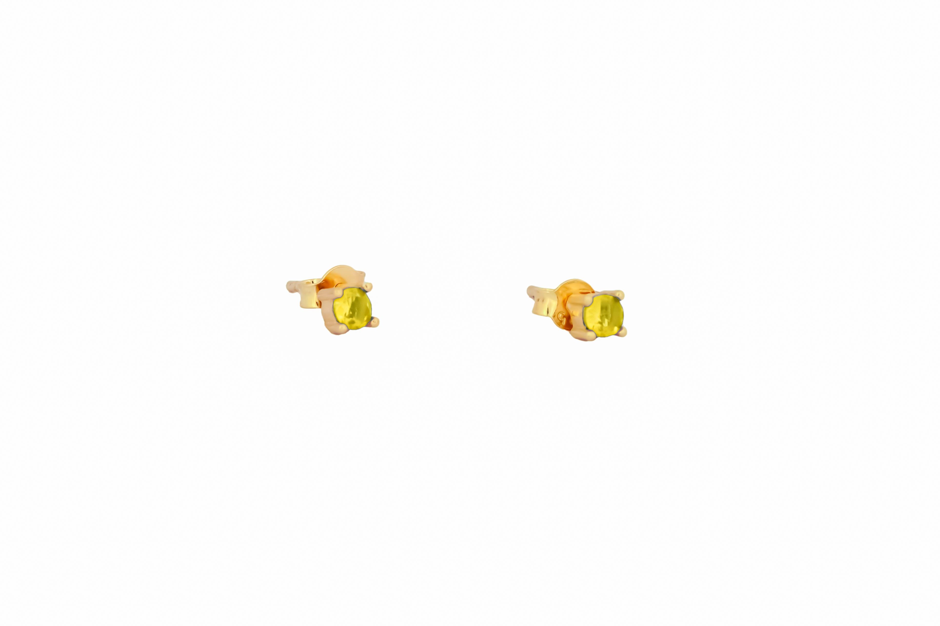 Modern 14 ct Gold Lab Sapphire Stud Earrings.   For Sale