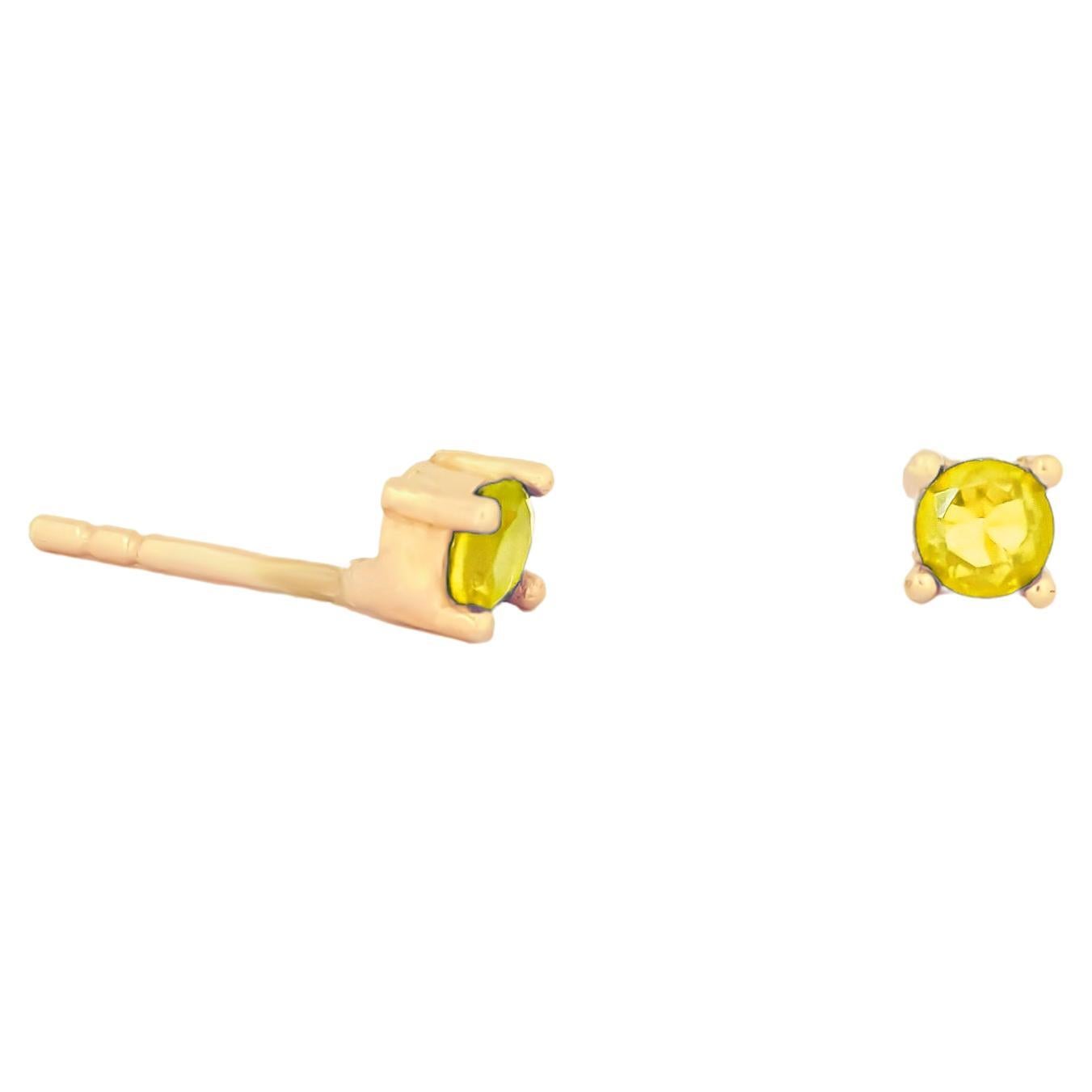 14 ct Gold Lab Sapphire Stud Earrings.  