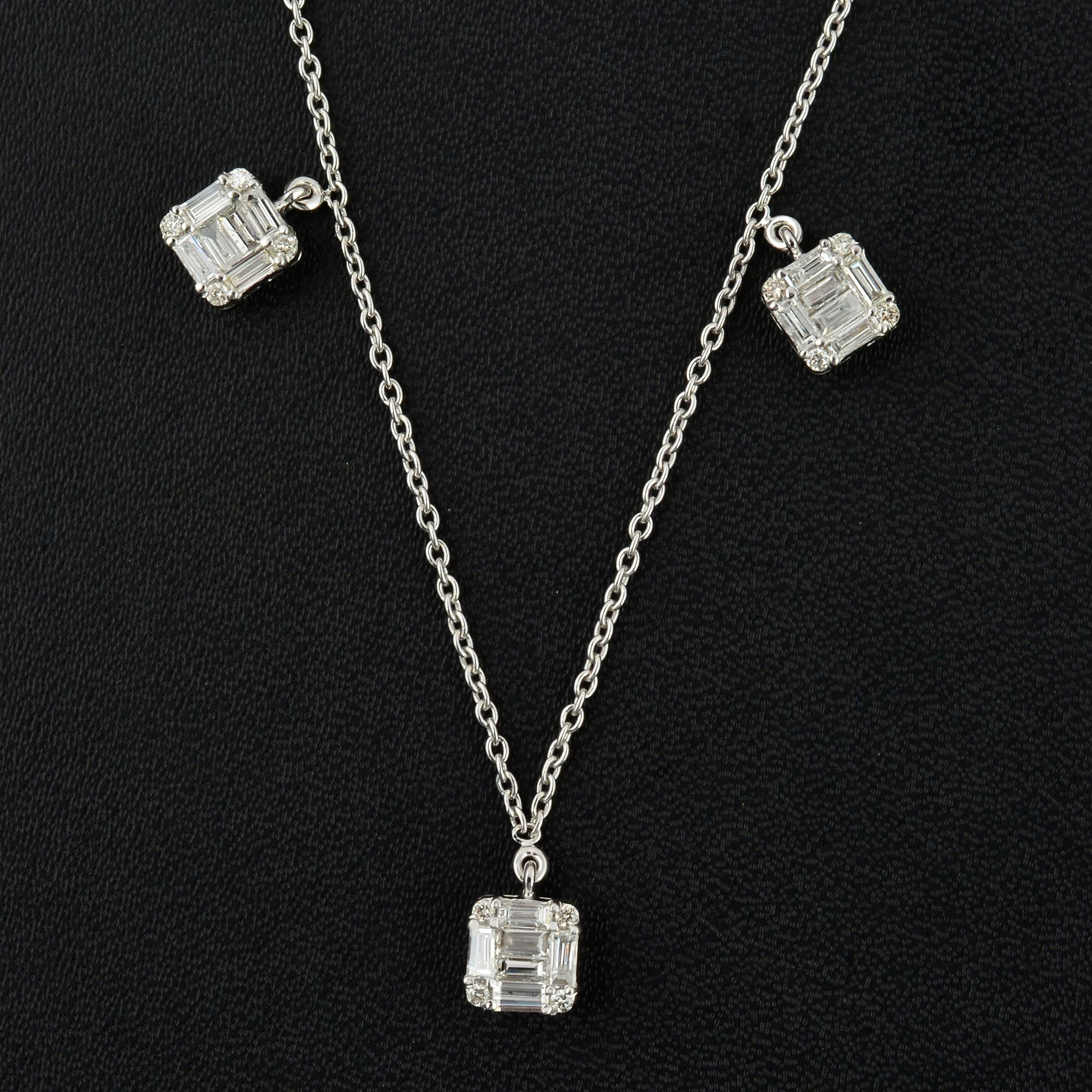 Elevate your jewelry collection with this exquisite baguette diamond charm necklace. Crafted in 18-karat white gold, this fine jewelry piece features a stunning array of baguette-cut diamonds with a total weight of 1.4 carats, showcasing exceptional