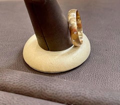 14 Flush Set Bezel Diamond Eternity Wedding Band in 14 Karat Yellow Gold