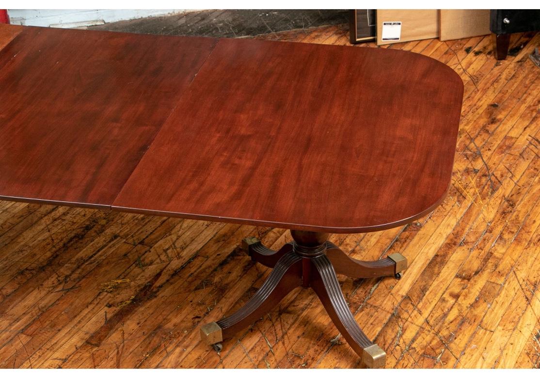 Long Classic 19th Century Triple Pedestal Mahogany Dining Table In Good Condition In Bridgeport, CT